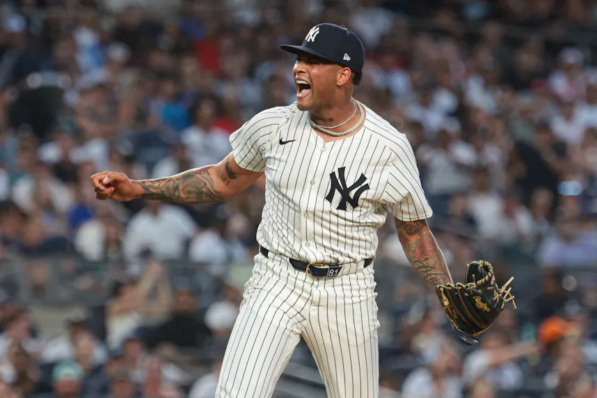 New York Yankees starting pitcher Luis Gil reacts after a strikeout as we look at our best Yankees vs. Phillies predictions and player props.