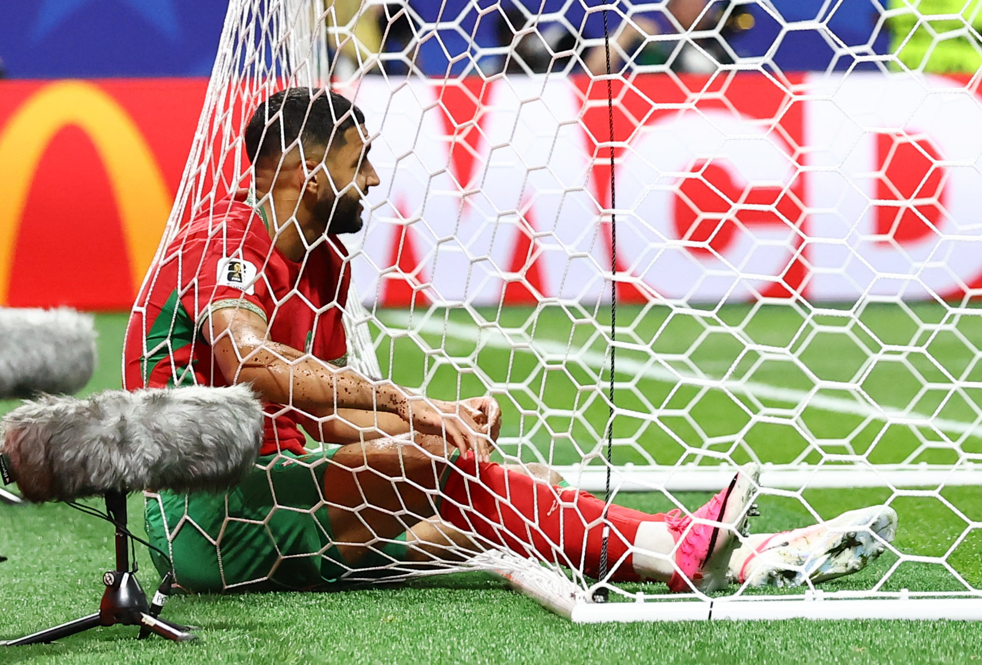 Morocco's Ismael Saibari in the goal net as we make our best Netherlands vs. Morocco prediction.