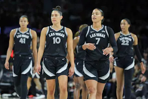 Kiah Stokes (41), Kelsey Plum (10), Alysha Clark (7) and A'ja Wilson (22) of the Las Vegas Aces walk on the court, as we offer our best Aces vs. Lynx prediction and expert picks for Wednesday's WNBA game at Target Center in Minneapolis.