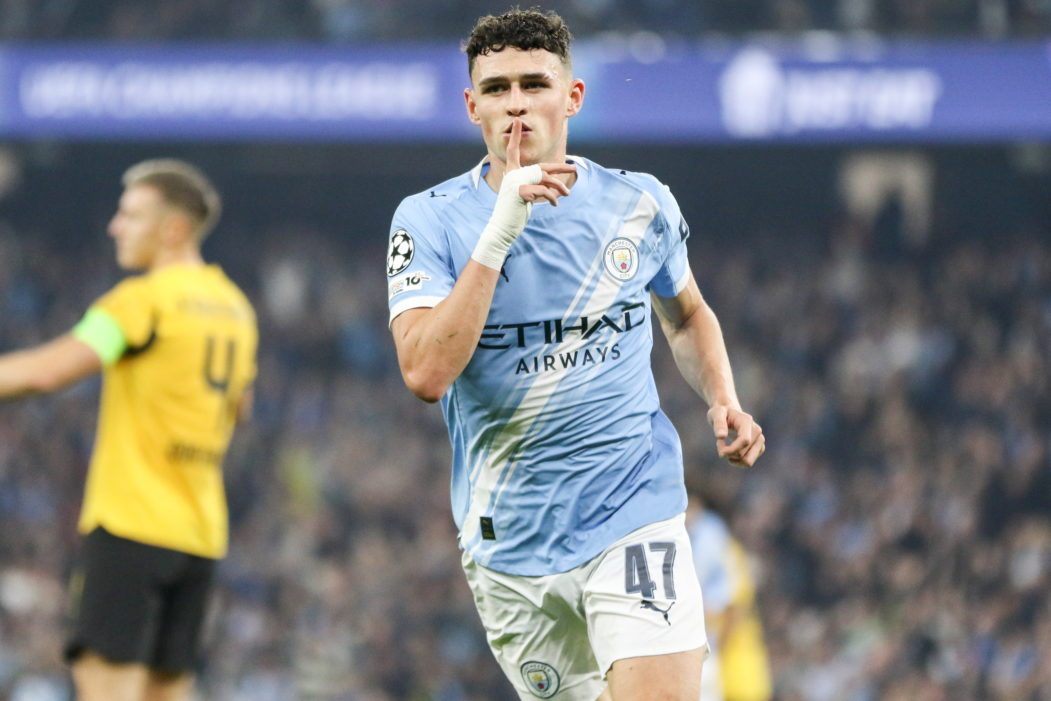 Phil Foden celebrates his goal as we offer the Premier League odds and predictions for Matchweek 12.