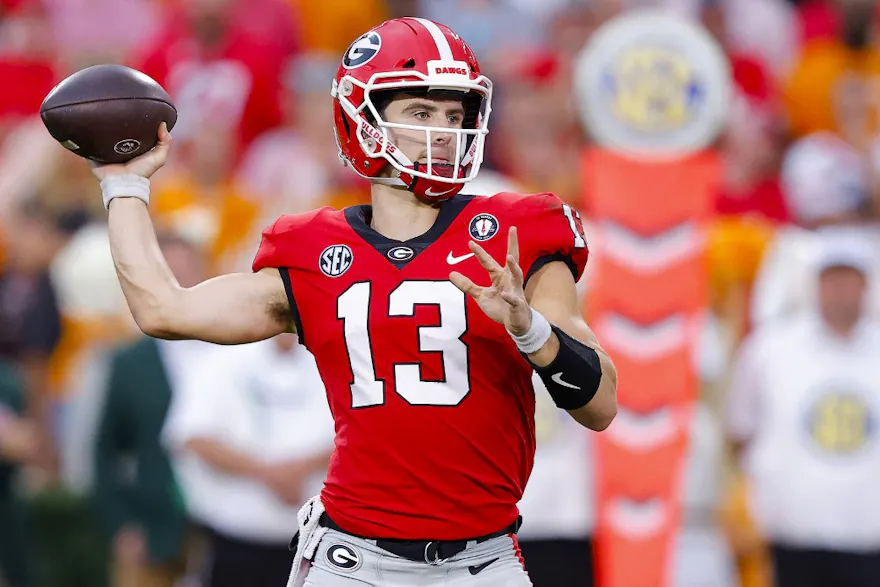 Stetson Bennett of the Georgia Bulldogs throws a pass against the Tennessee Volunteers during the third quarter at Sanford Stadium.