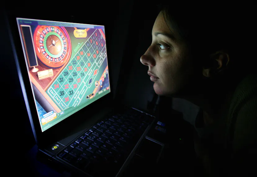Undated file photo of a woman using an internet gambling website to play online roulette as we look at Inspired Entertainment's Q3 2024 revenue boosts