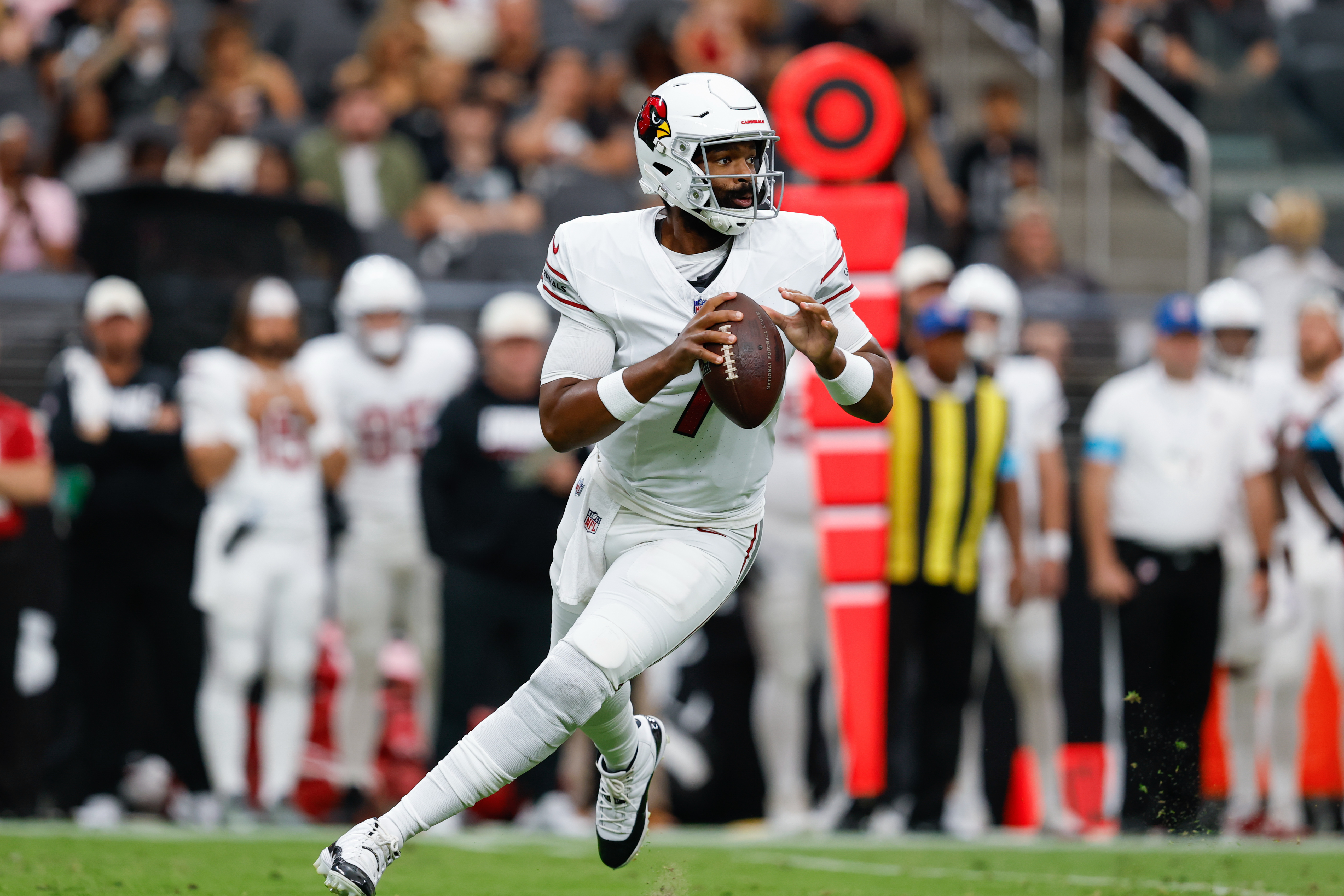 Arizona Cardinals quarterback Jacoby Brissett (7) drops back to pass as he is featured in our Cardinals vs. Chargers prediction.