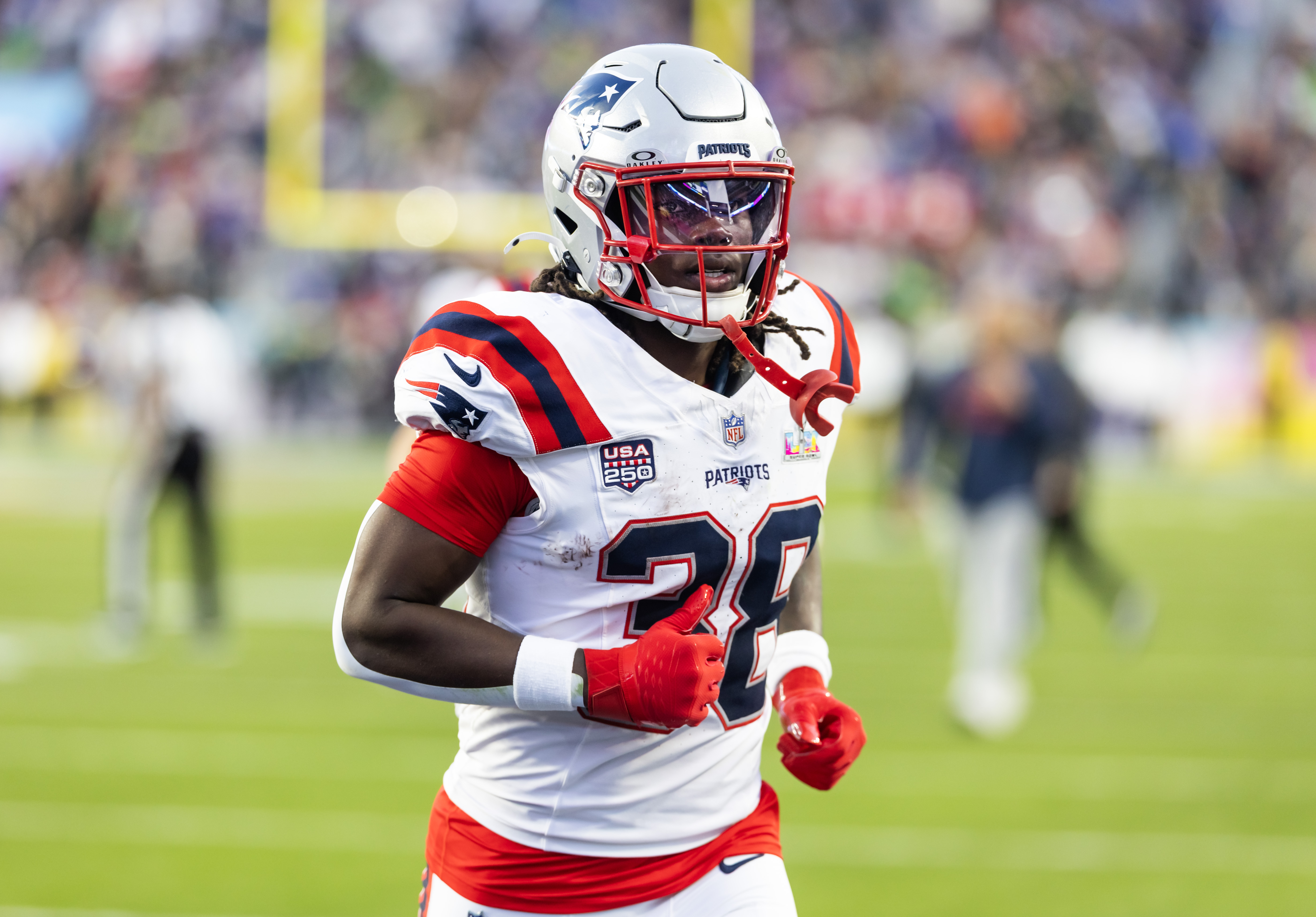 New England Patriots running back Rhamondre Stevenson (38) looks on as we break down our Patriots vs. Seahawks same game parlay.