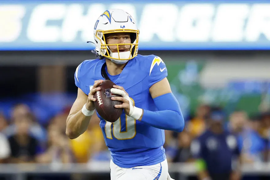 Justin Herbert #10 of the Los Angeles Chargers drops back to pass as we look at our best Chargers vs. Jets prediction for MNF
