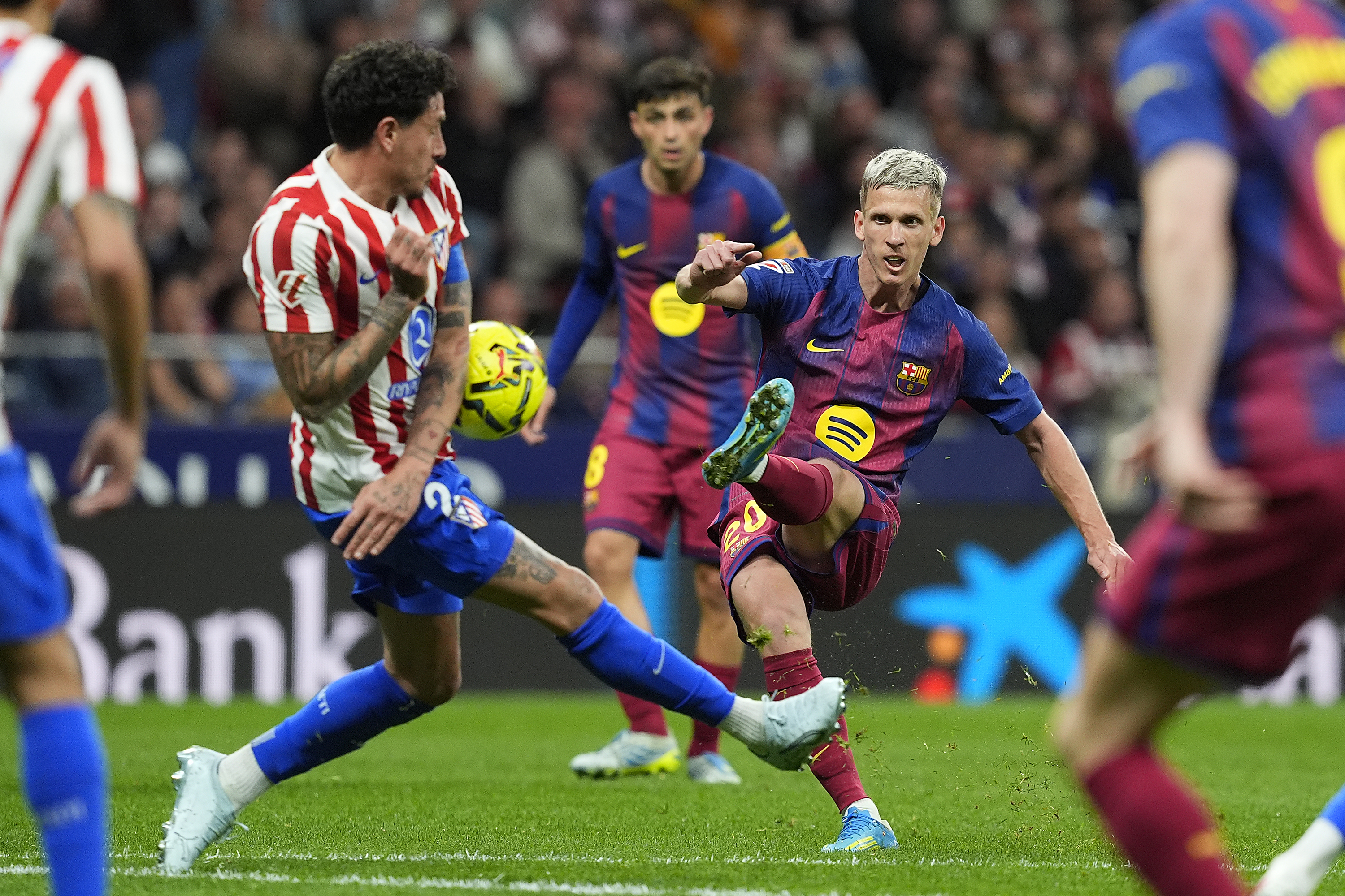 Atletico de Madrid's Jose Maria Gimenez and FC Barcelona's Dani Olmo as we make our best Barcelona vs. Atletico Madrid.
