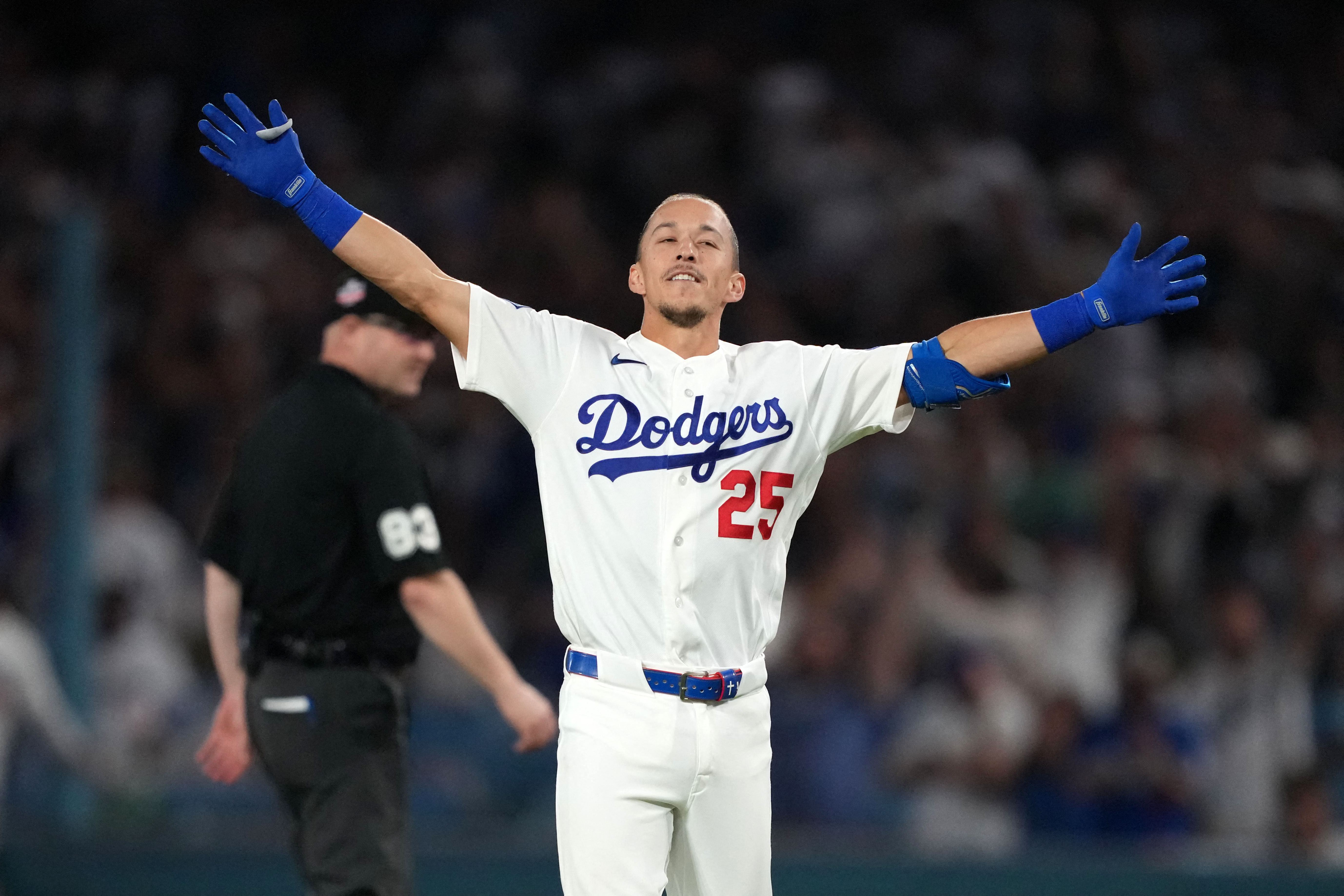 Los Angeles Dodgers second baseman Tommy Edman celebrates as we look at the Los Angeles Dodgers sponsorship deal with Kalshi.