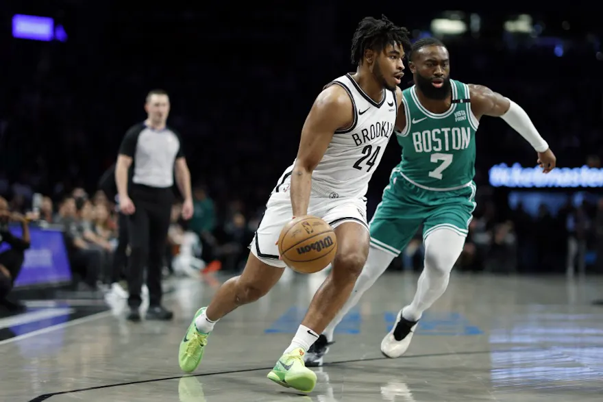 Cam Thomas of the Brooklyn Nets dribbles against Jaylen Brown of the Boston Celtics during the first half at Barclays Center. We're backing Cam Thomas in our Nets vs. Raptors NBA player props.