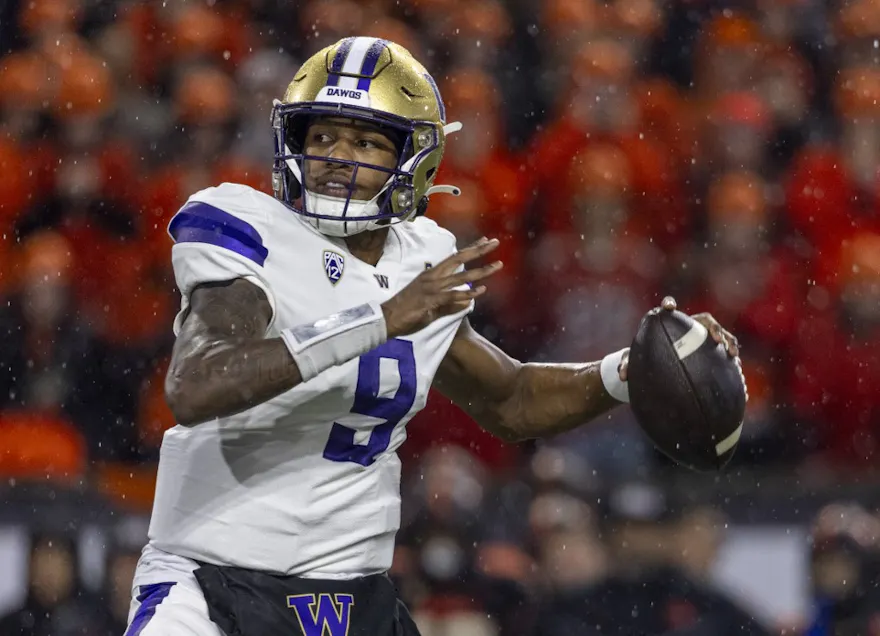 Quarterback Michael Penix Jr. of the Washington Huskies passes the ball for a touchdown during the first quarter against the Oregon State Beavers as we look at our Texas-Washington prediction.