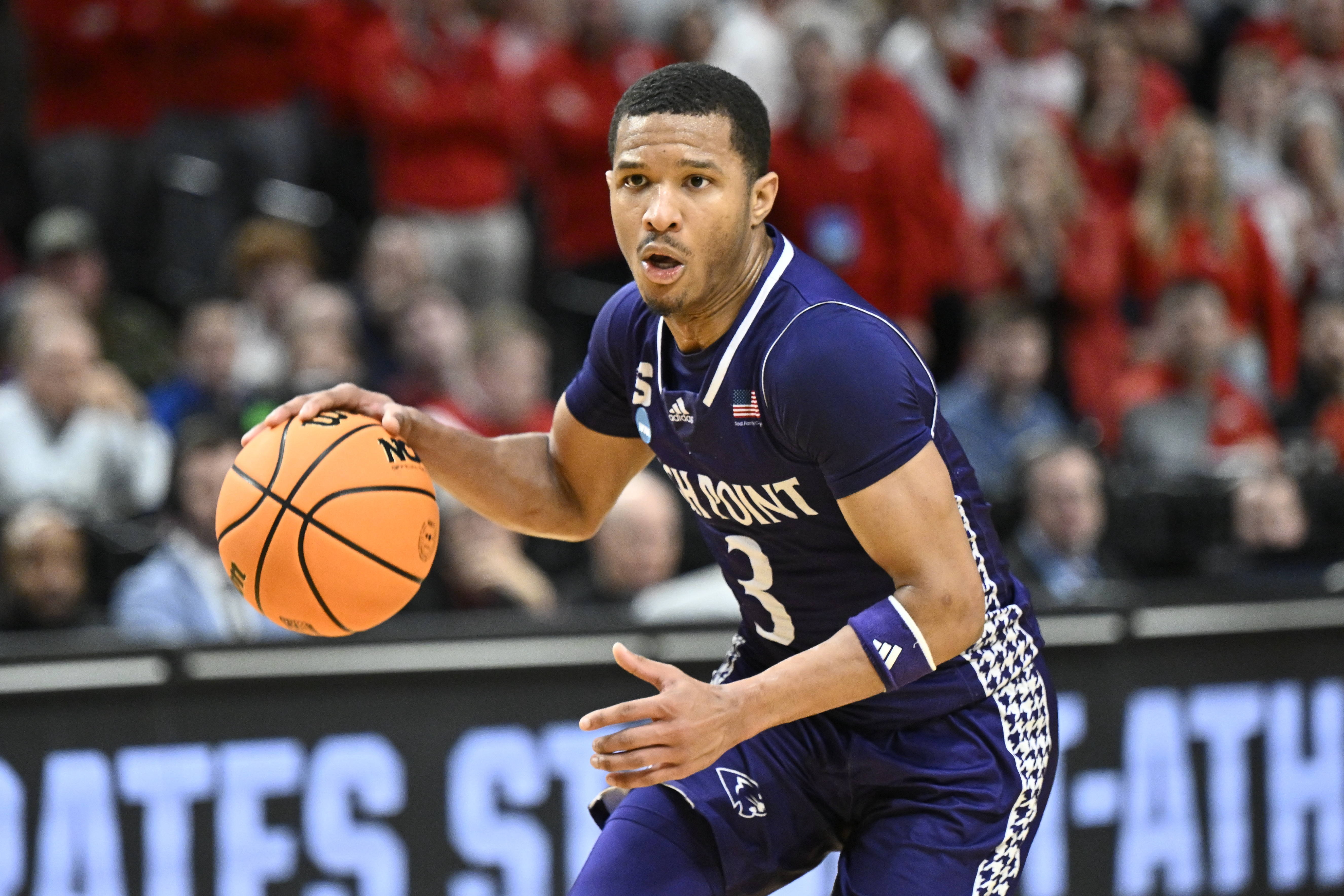 High Point Panthers guard Rob Martin (3) dribbles as we break down our High Point vs. Arkansas prediction & parlay.