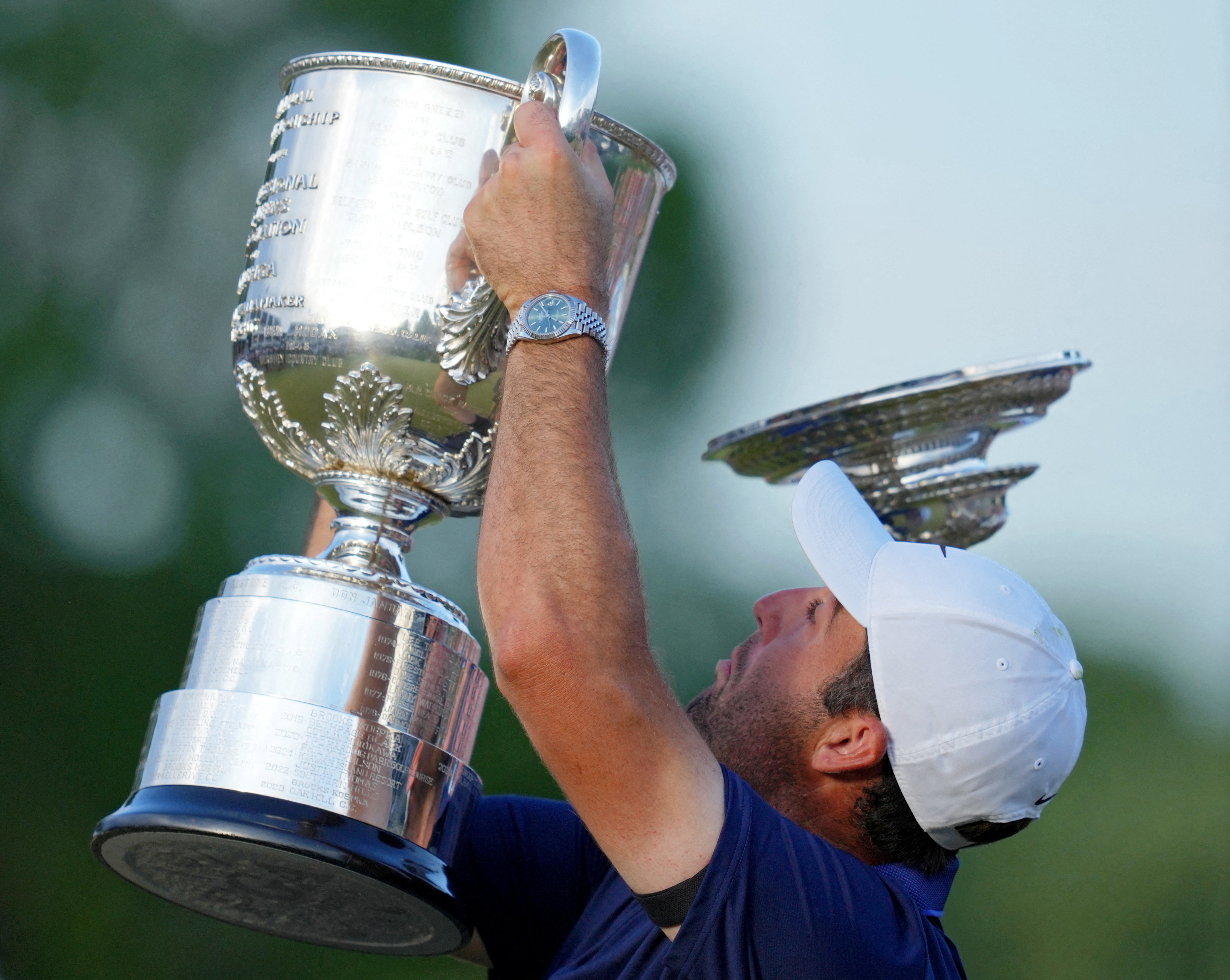 Scottie Scheffler holds up the Wanamaker Trophy as the top falls off after winning the PGA Championship, and we look at the PGA Championship odds