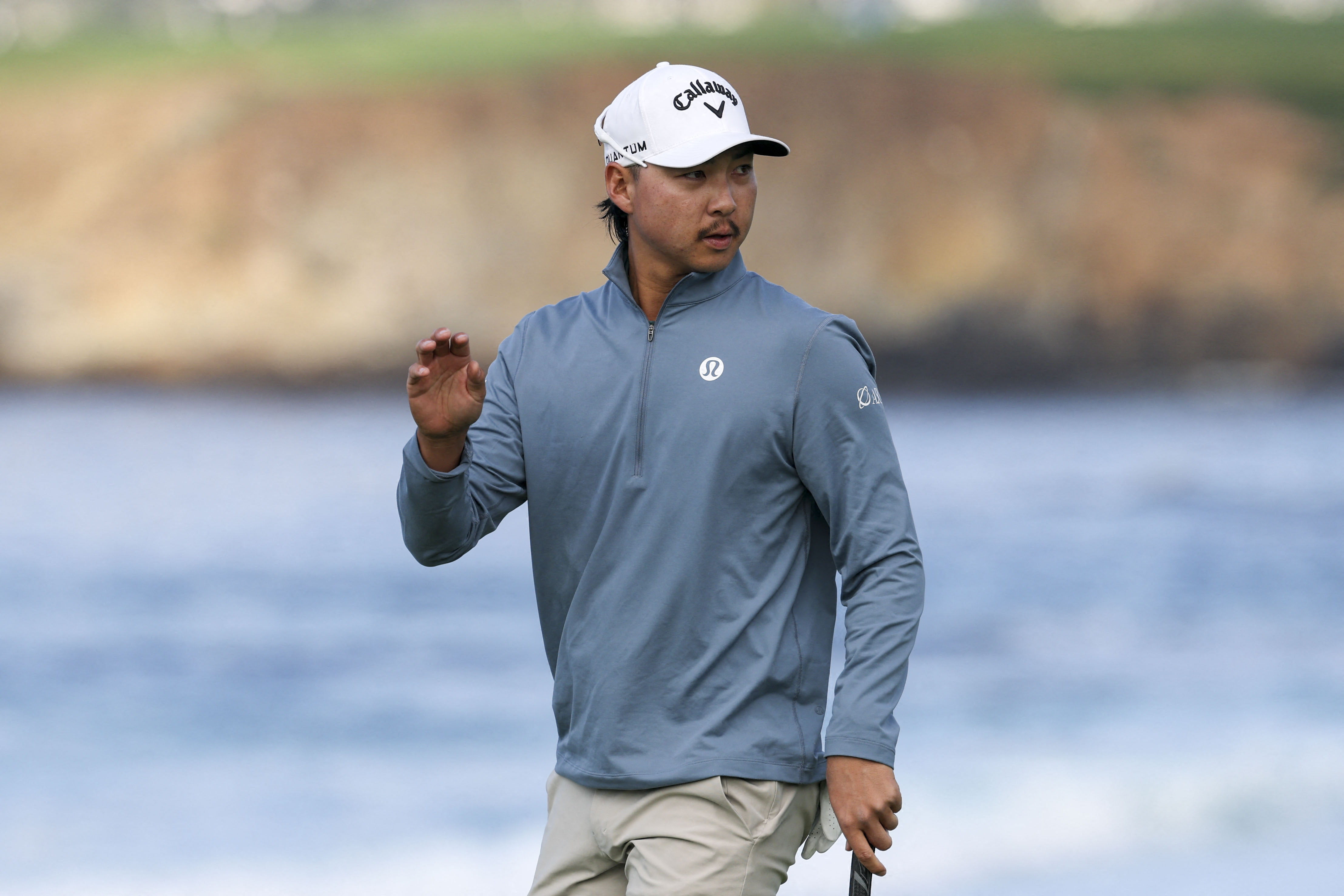 Min Woo Lee acknowledges the crowd after making his putt as we look at our Arnold Palmer Invitational first-round leader predictions