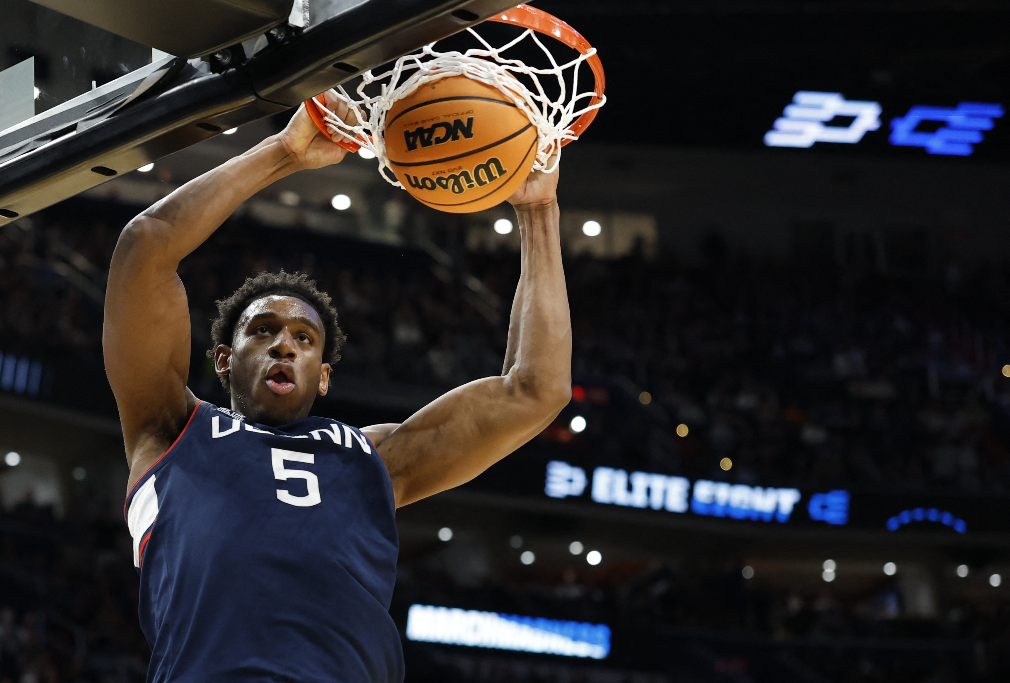 UConn Huskies forward Tarris Reed Jr. dunks as we make our best Illinois vs. UConn player prop predictions.