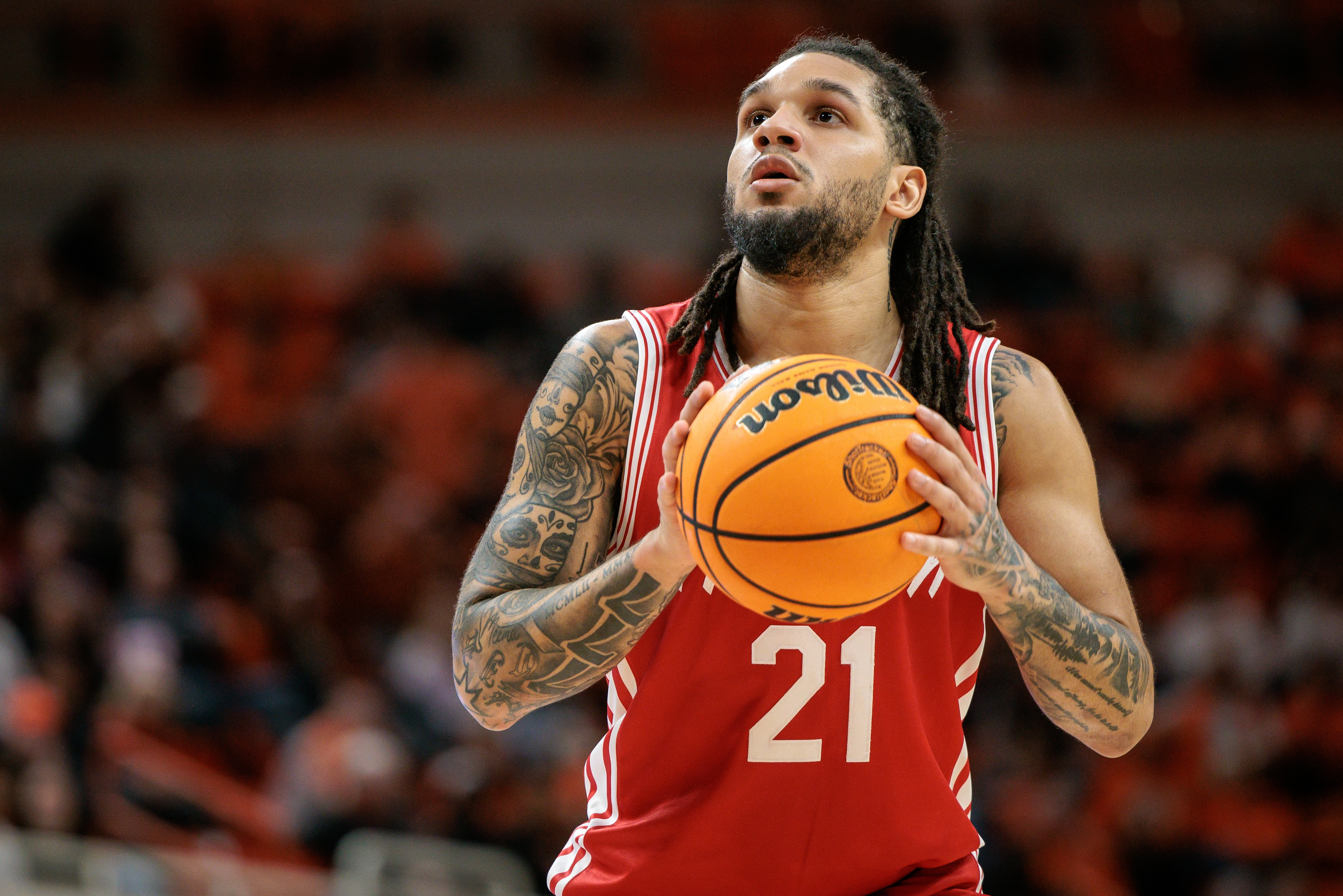Houston Cougars guard Emanuel Sharp (21) shoots a free as he is featured in our College Basketball best bets.