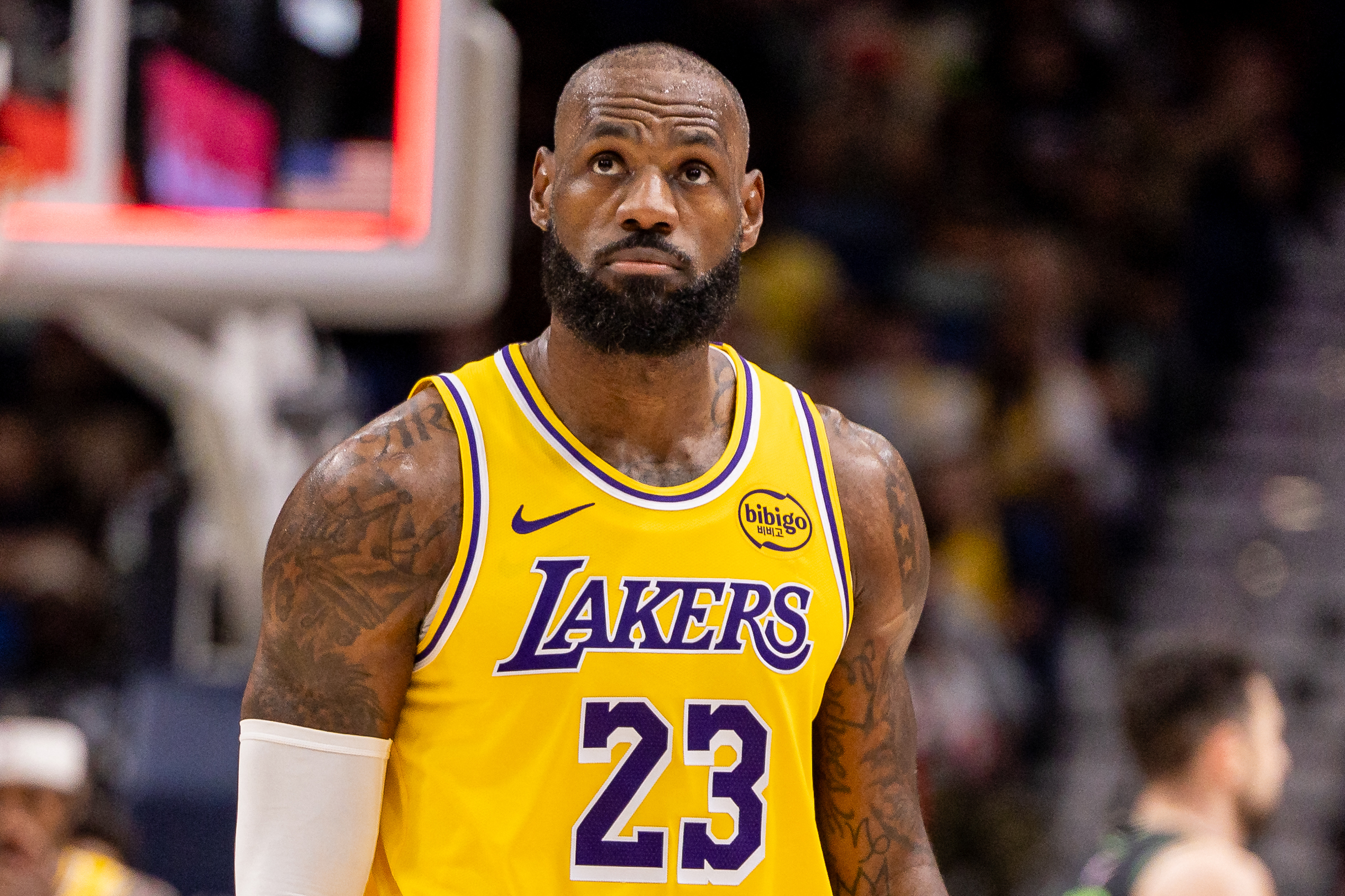 Los Angeles Lakers forward LeBron James (23) looks on as we break down our NBA player props tonight.