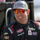 Kyle Busch, driver of the Zariz Transport Chevrolet, looks on during practice for the NASCAR CRAFTSMAN Truck Series Victoria's Voice Foundation 200 at Las Vegas Motor Speedway.