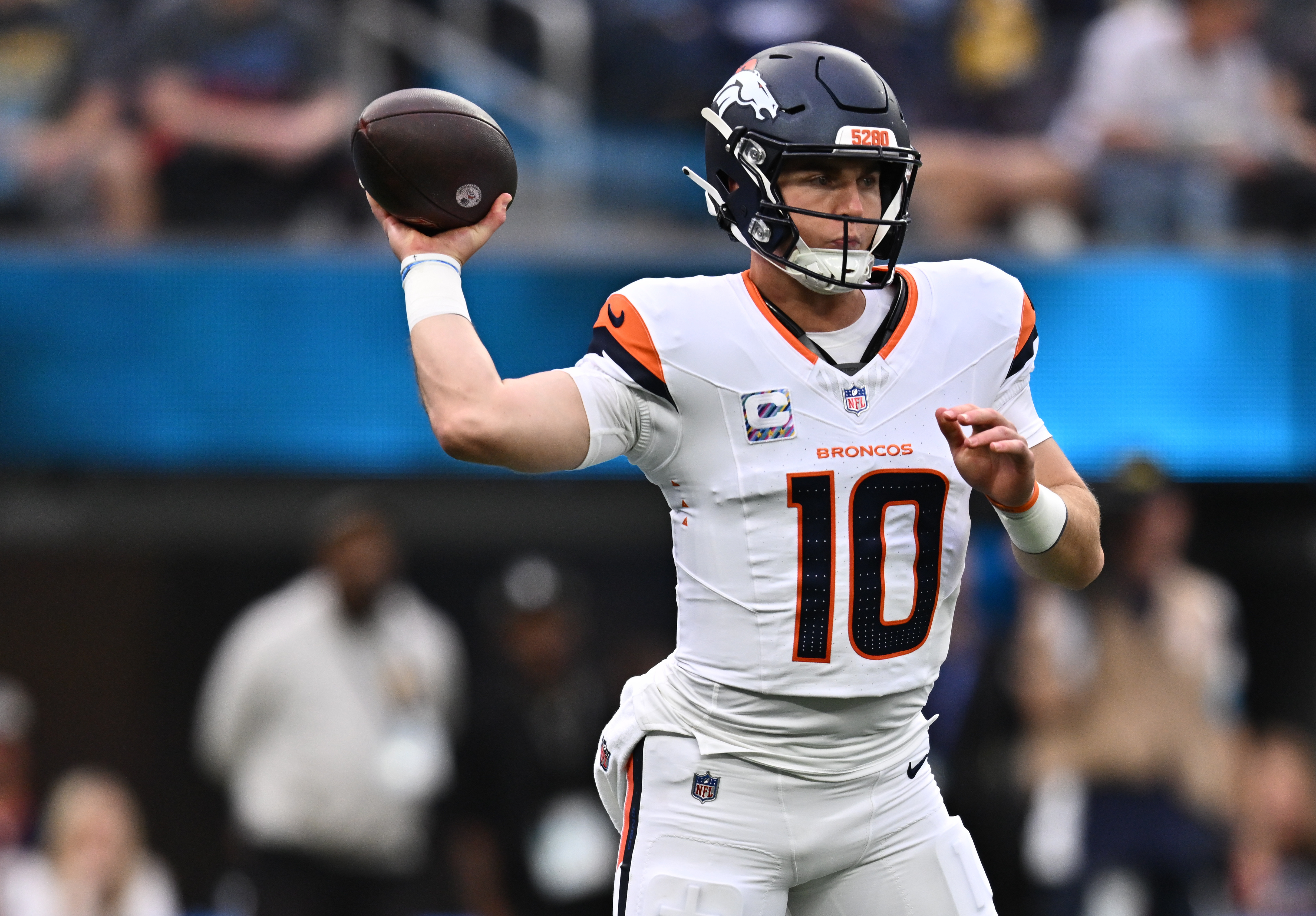 Denver Broncos quarterback Bo Nix (10) throws a pass against the Los Angeles Chargers as we make our best Seahawks vs. Broncos prediction. 