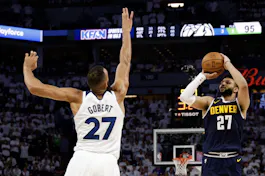 Jamal Murray of the Denver Nuggets takes a shot over Rudy Gobert of the Minnesota Timberwolves during the Game 4 of the NBA playoffs. We're looking at the Jamal Murray odds ahead of Game 6.