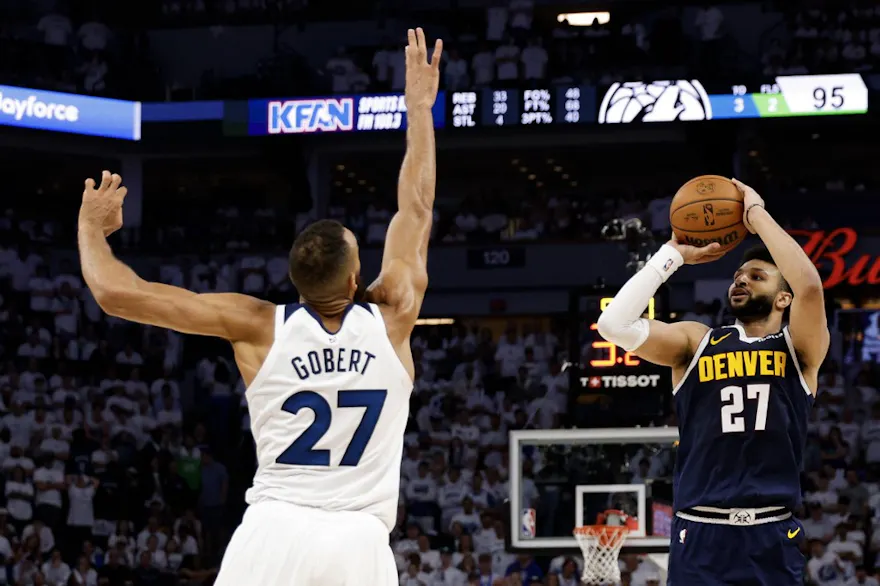 Jamal Murray of the Denver Nuggets takes a shot over Rudy Gobert of the Minnesota Timberwolves during the Game 4 of the NBA playoffs. We're looking at the Jamal Murray odds ahead of Game 6.