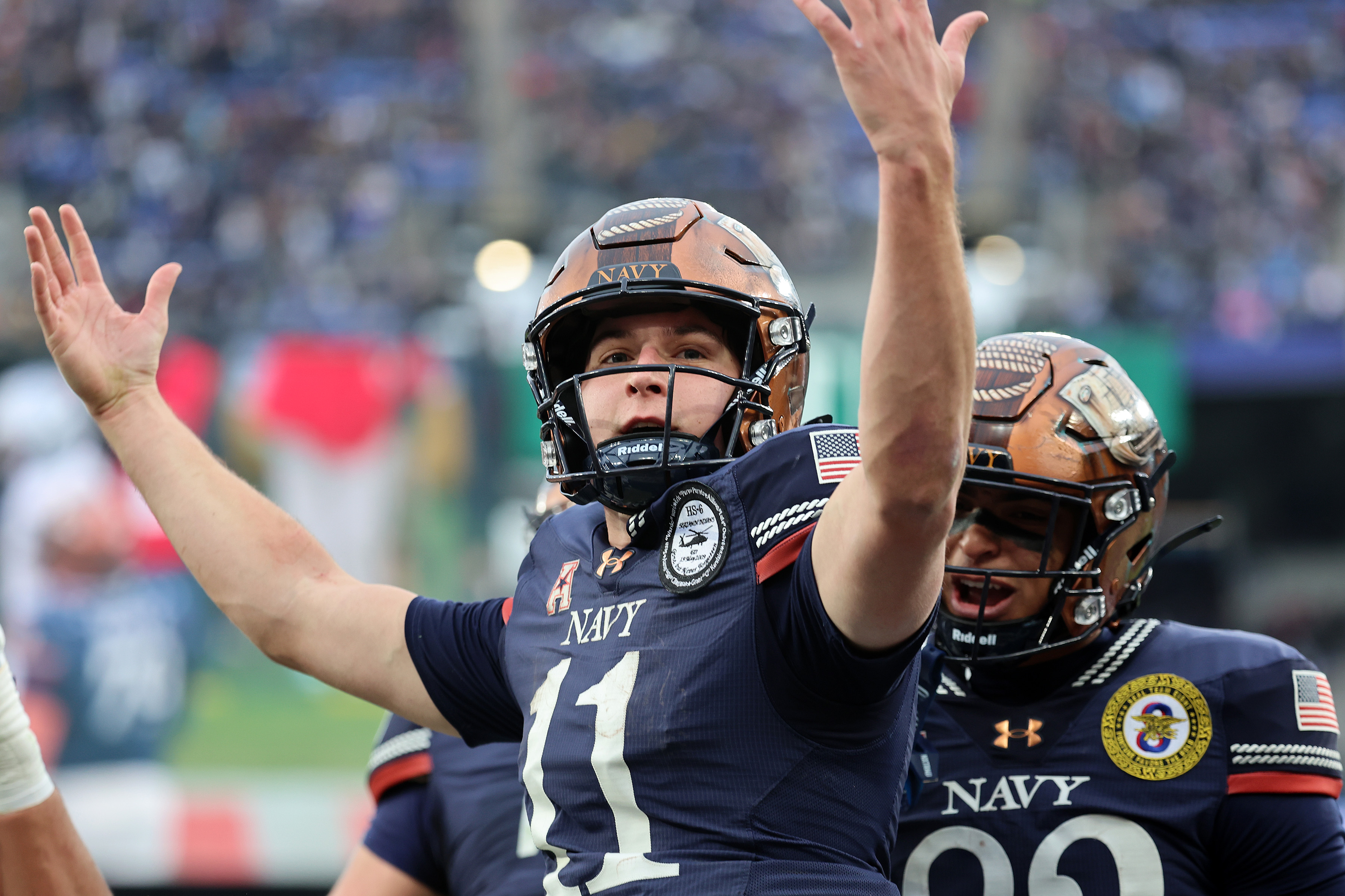 Navy Midshipmen quarterback Blake Horvath (11) reacts as we break down our Navy vs. Cincinnati predictions.