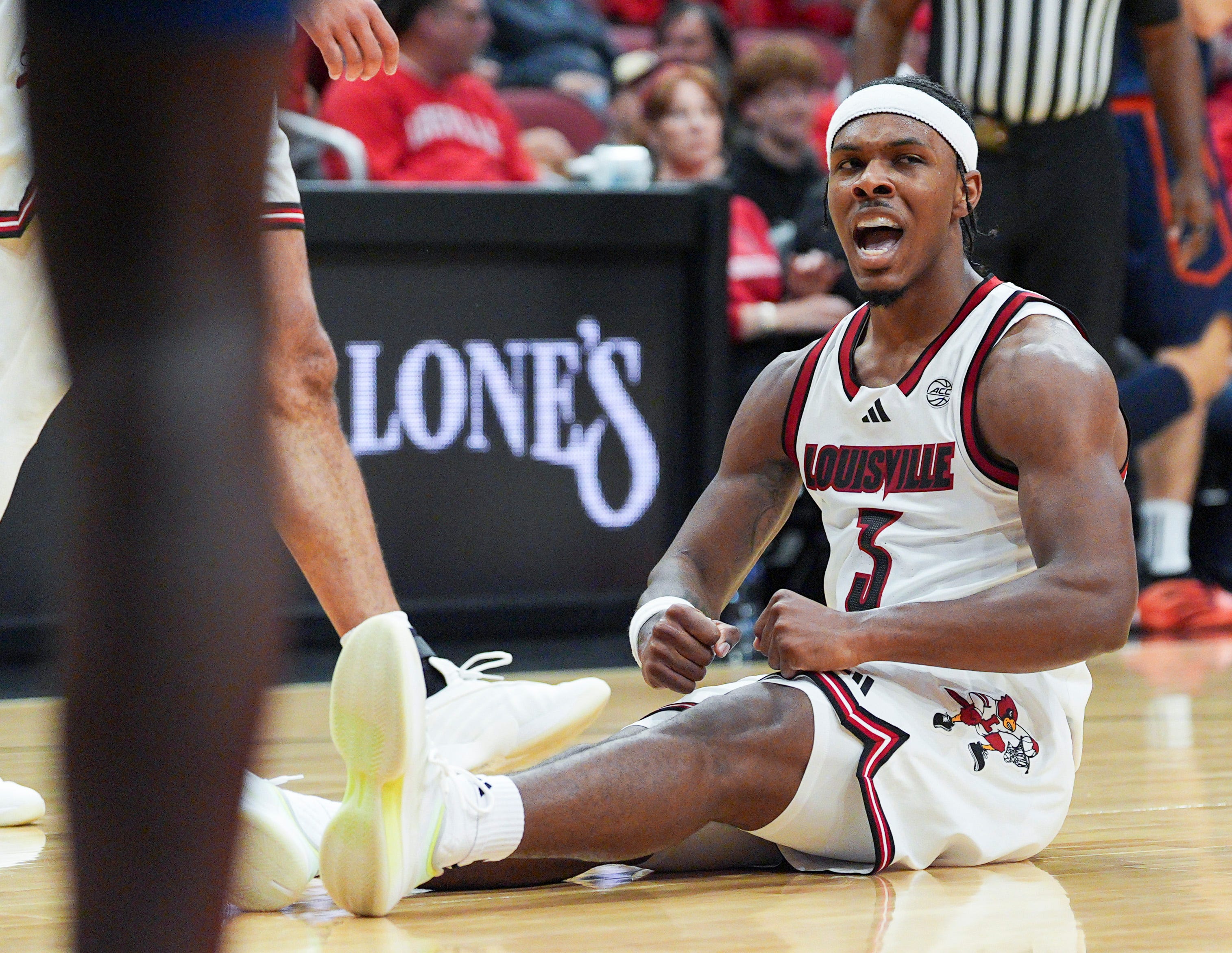 Louisville guard Ryan Conwell reacts after drawing a foul as we provide our college basketball best bets today