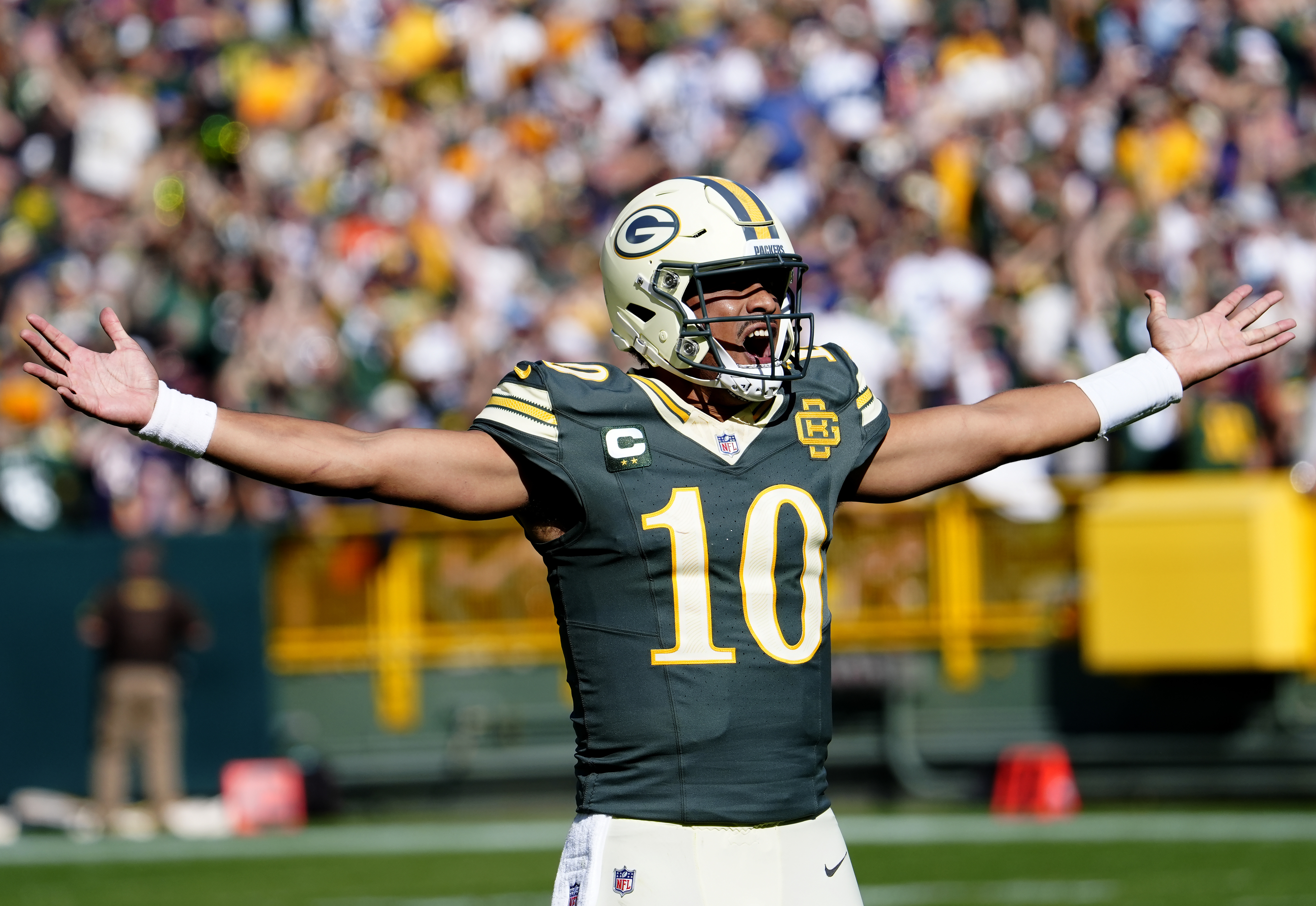 Green Bay Packers quarterback Jordan Love (10) celebrate as he is featured in our Cowboys vs. Packers same-game parlay
