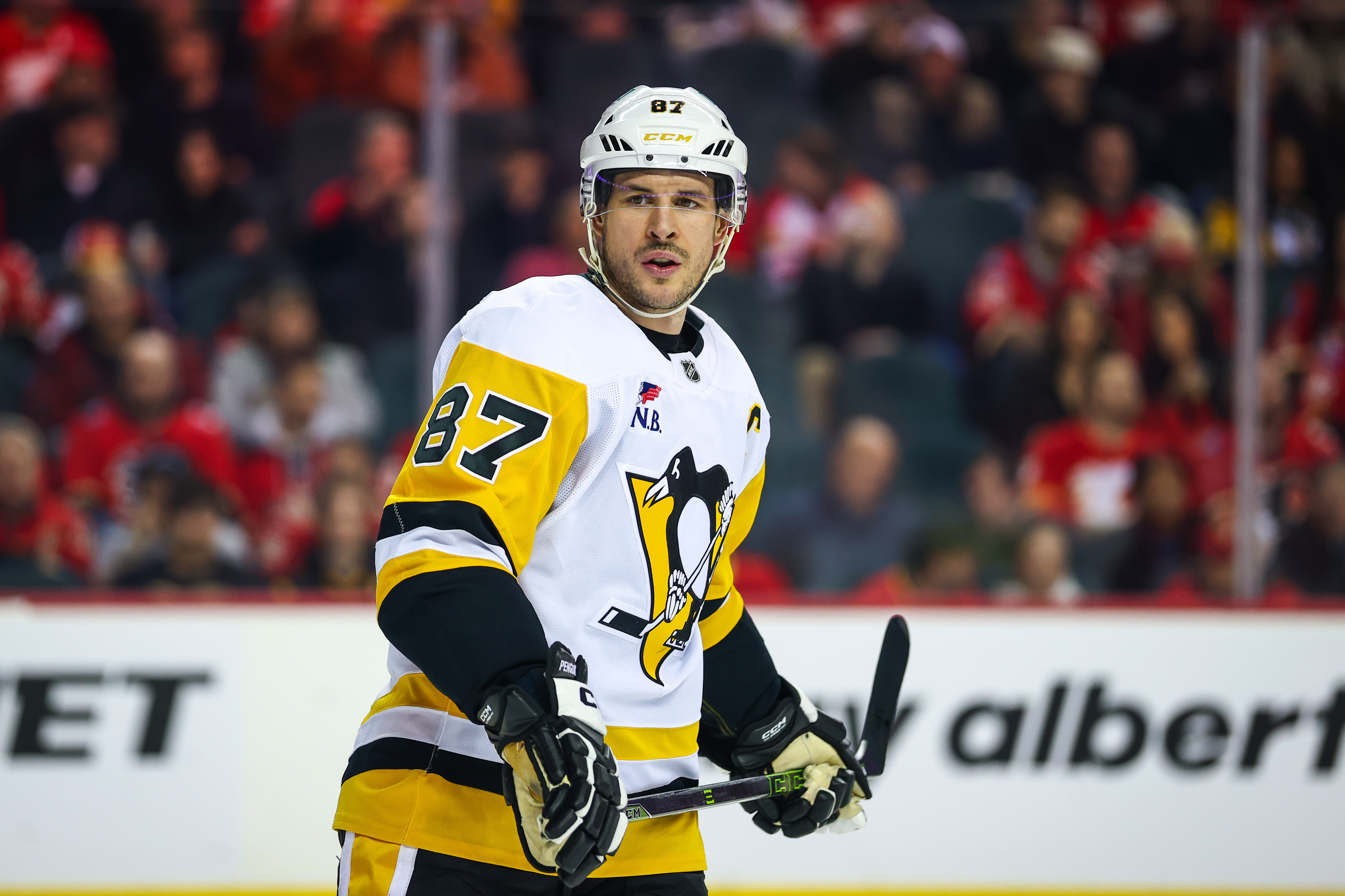 Pittsburgh Penguins center Sidney Crosby (87) looks on as we provide our NHL playoff predictions.