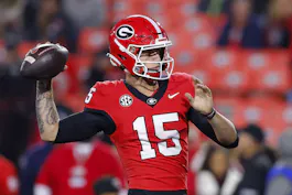 Carson Beck of the Georgia Bulldogs warms up before the game against the Mississippi Rebels, as we look at the 2024 Heisman odds.