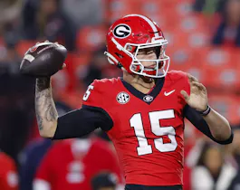 Carson Beck of the Georgia Bulldogs warms up before the game against the Mississippi Rebels, as we look at the 2024 Heisman odds.