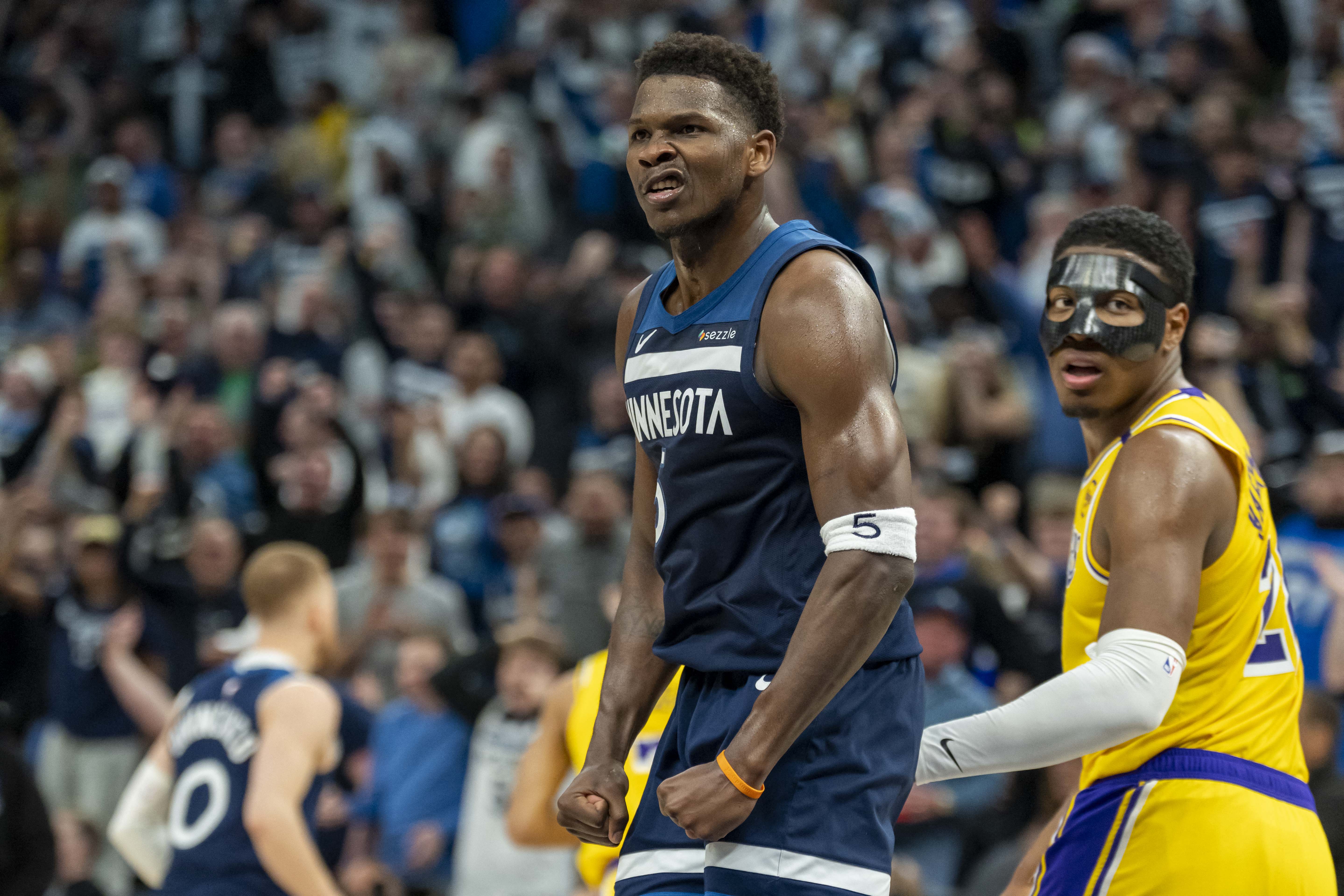 Minnesota Timberwolves guard Anthony Edwards (5), seen here reacting after a made shot, is featured in our Mavericks vs. Timberwolves player props tonight.