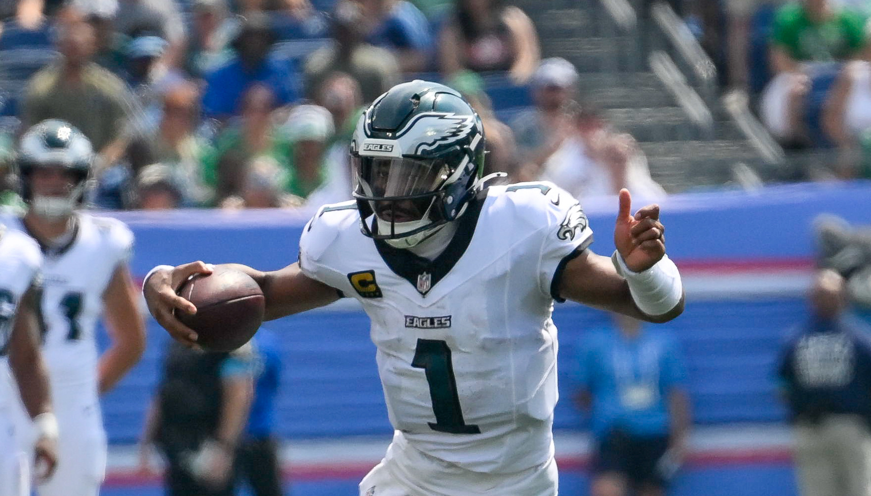 Jalen Hurts scrambles with the football as we make our best Eagles vs. Bears prediction.