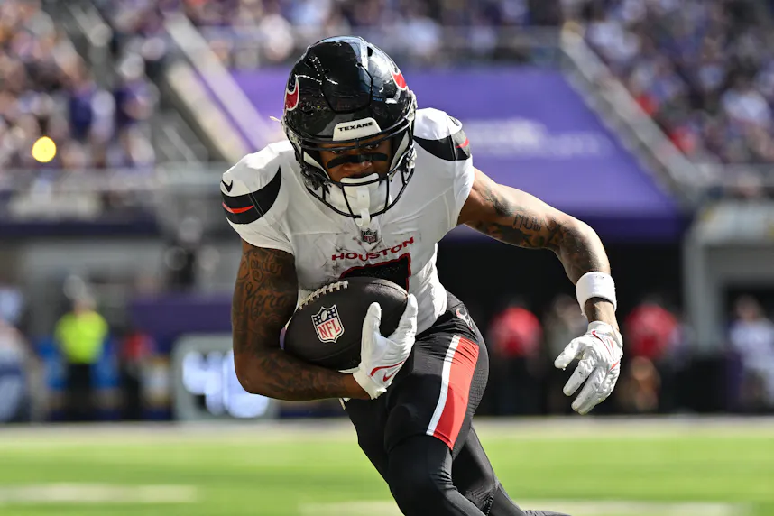 Houston Texans wide receiver Tank Dell runs the ball as we look at our anytime touchdown scorer predictions for Week 7.