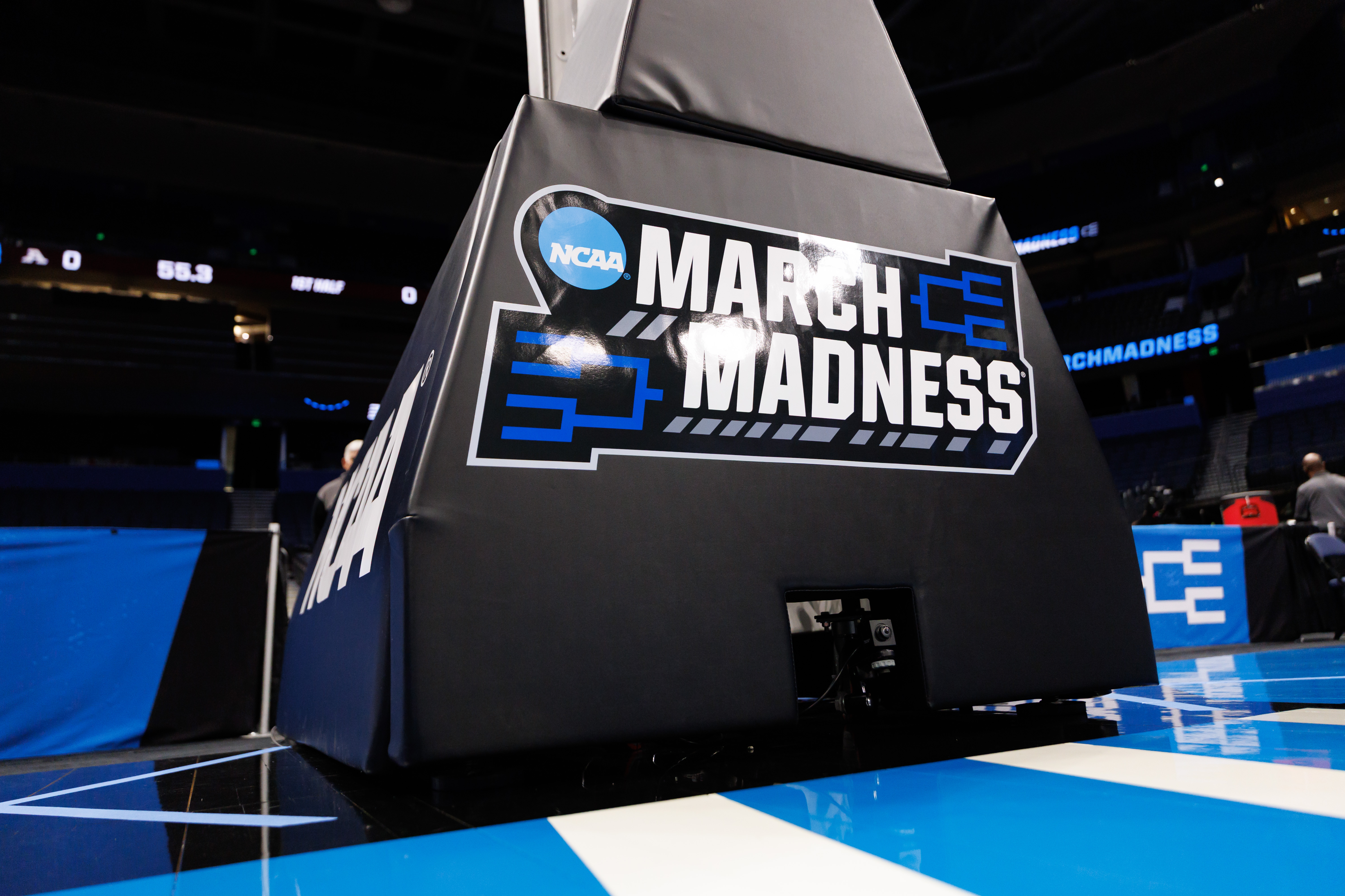 A general view of the backboard stanchion with NCAA March Madness logos during a practice session as we round up our March Madness predictions