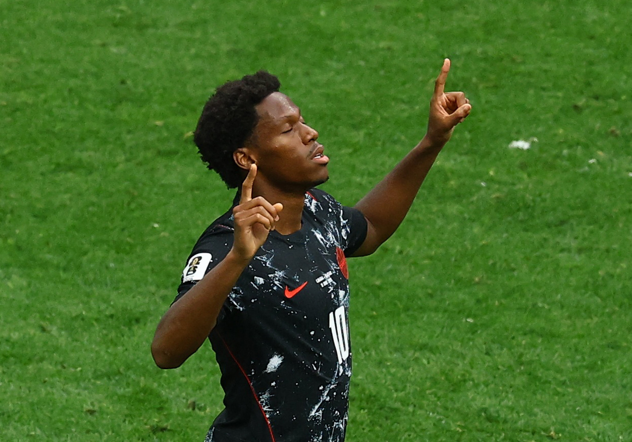 Canada's Jonathan David celebrates scoring as we make our best Switzerland vs. Canada prediction