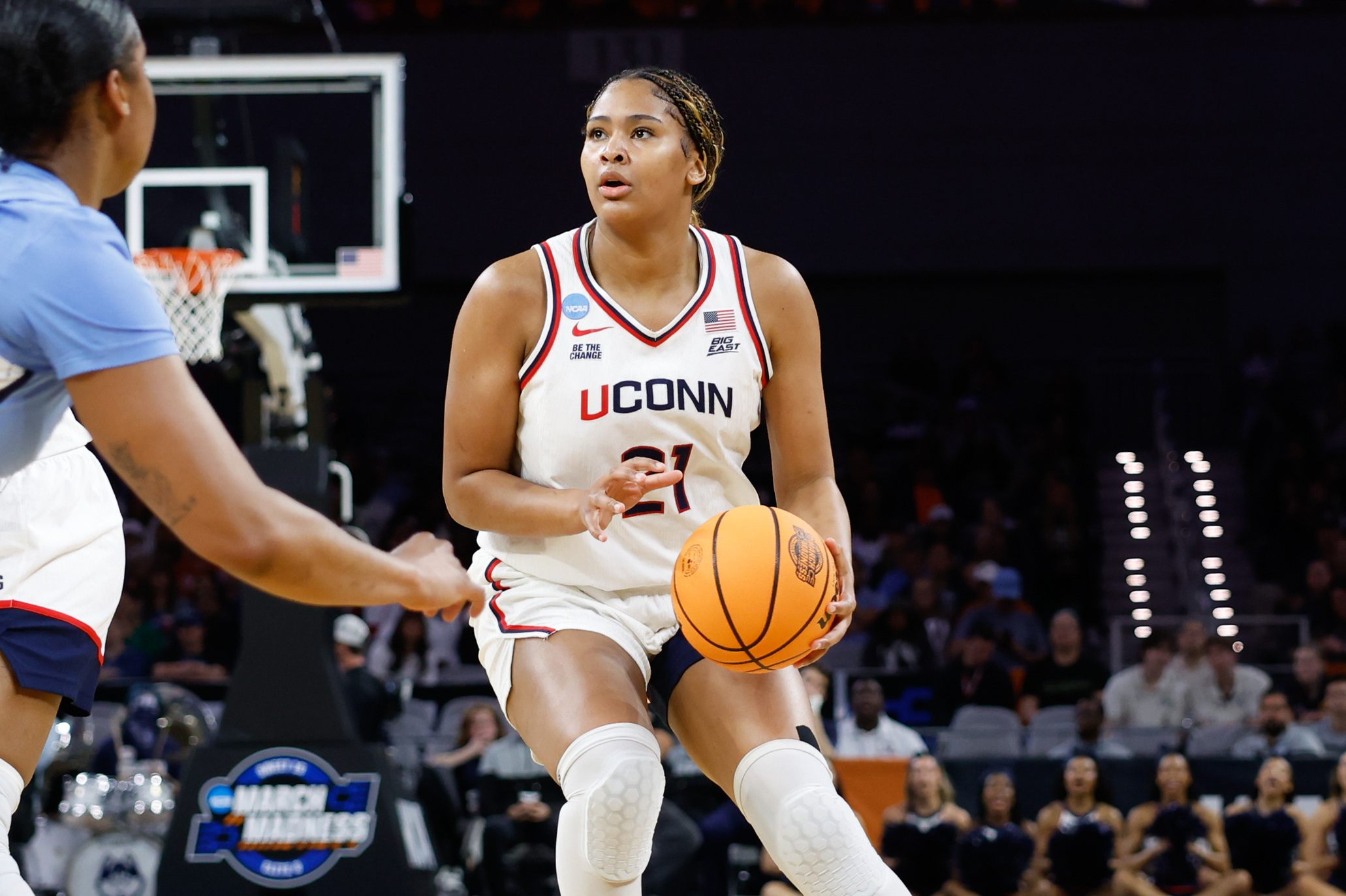 UConn Huskies forward Sarah Strong controls dribbles as we make our best South Carolina vs. UConn prediction.