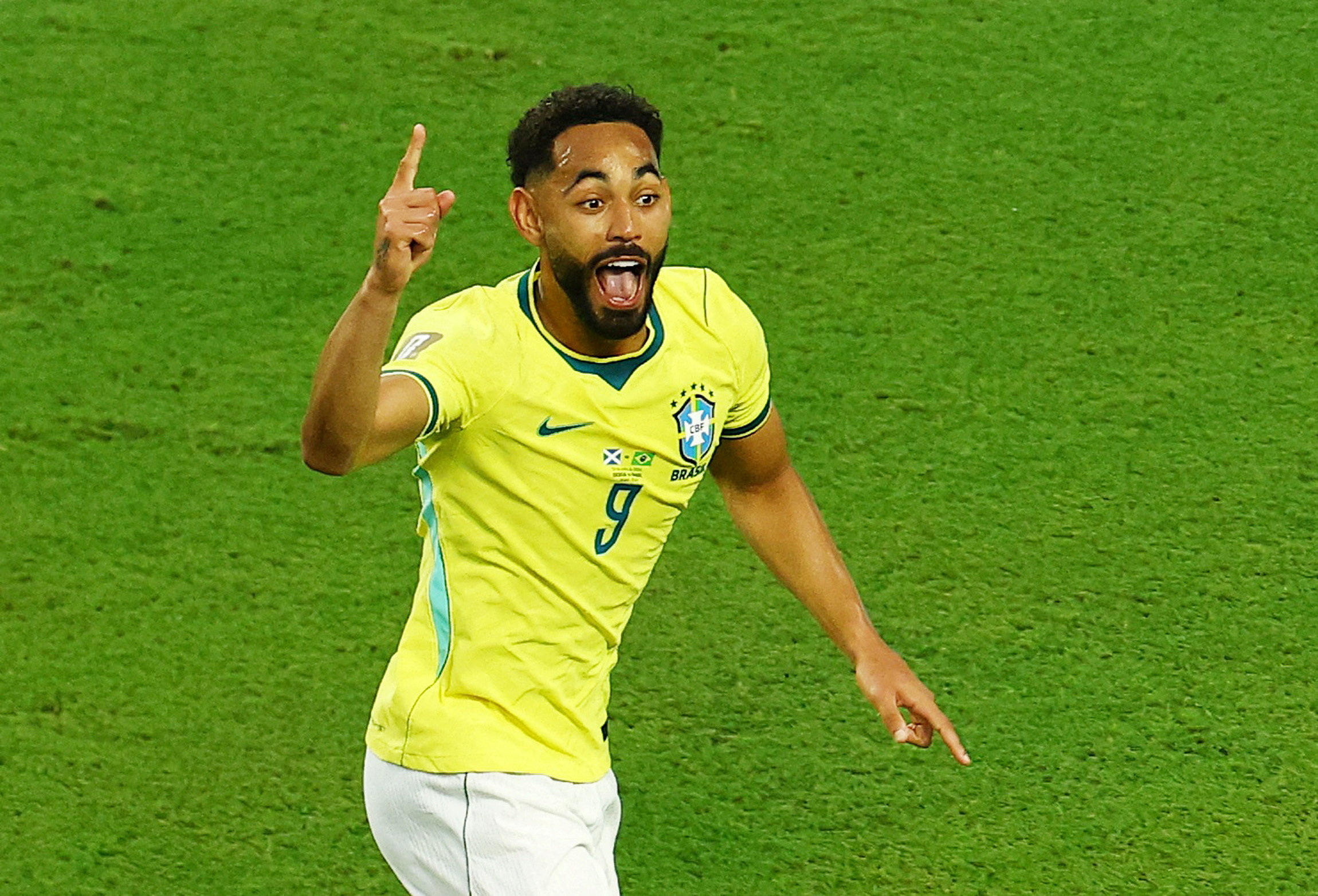 Brazil's Matheus Cunha celebrates as we break down our Brazil vs. Norway prediction.