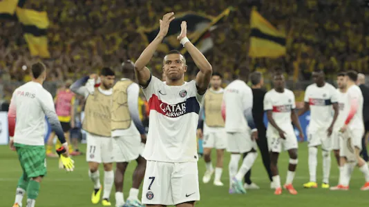 Kylian Mbappe of PSG salutes the supporters following the UEFA Champions League semifinals as we look at our PSG vs. Dortmund prediction.