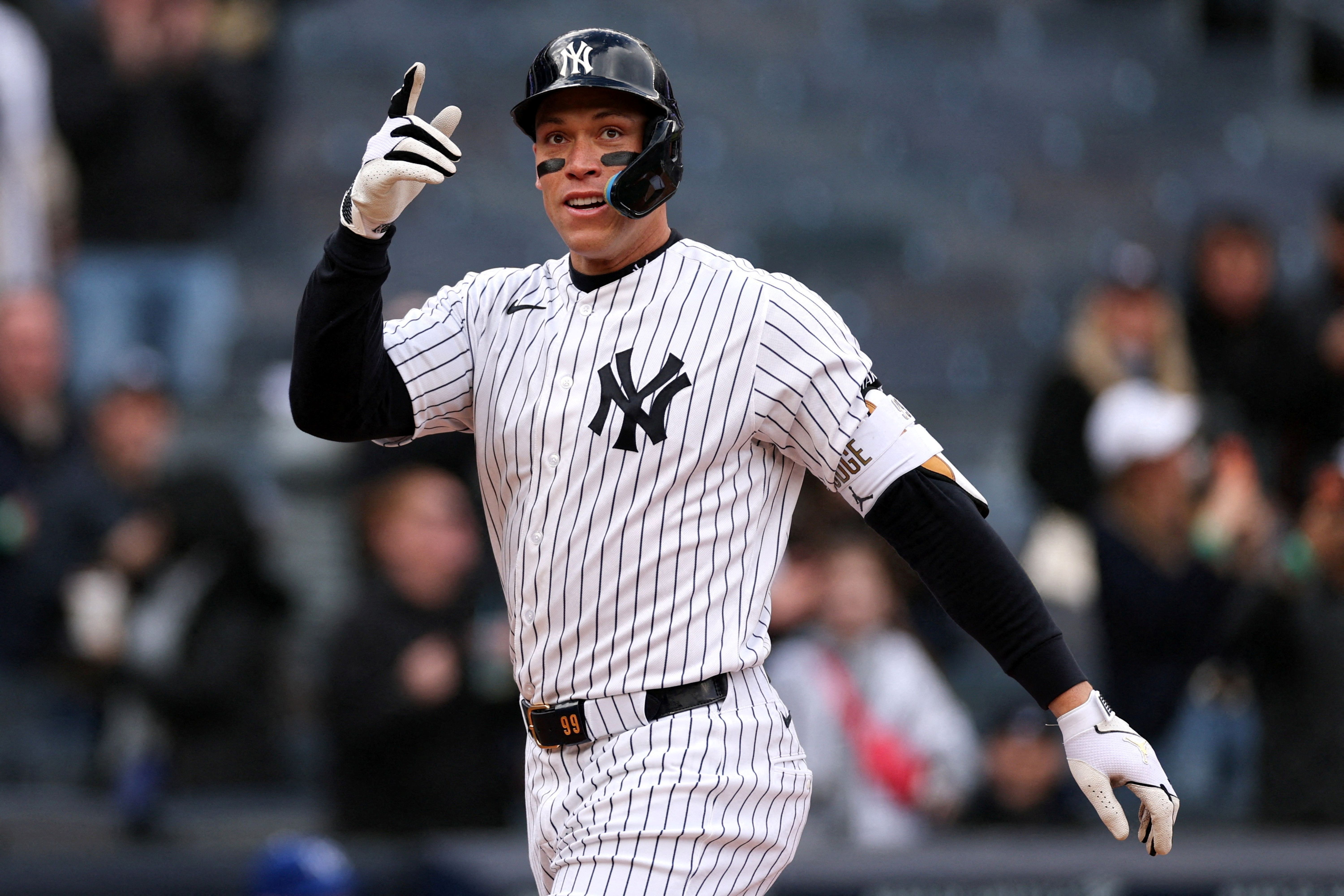 New York Yankees right fielder Aaron Judge reacts after hitting a homer, and he's featured in our best home run predictions today