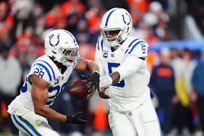 Indianapolis Colts quarterback Anthony Richardson hands off to running back Jonathan Taylor as we look at the sports betting financials for November 2024.