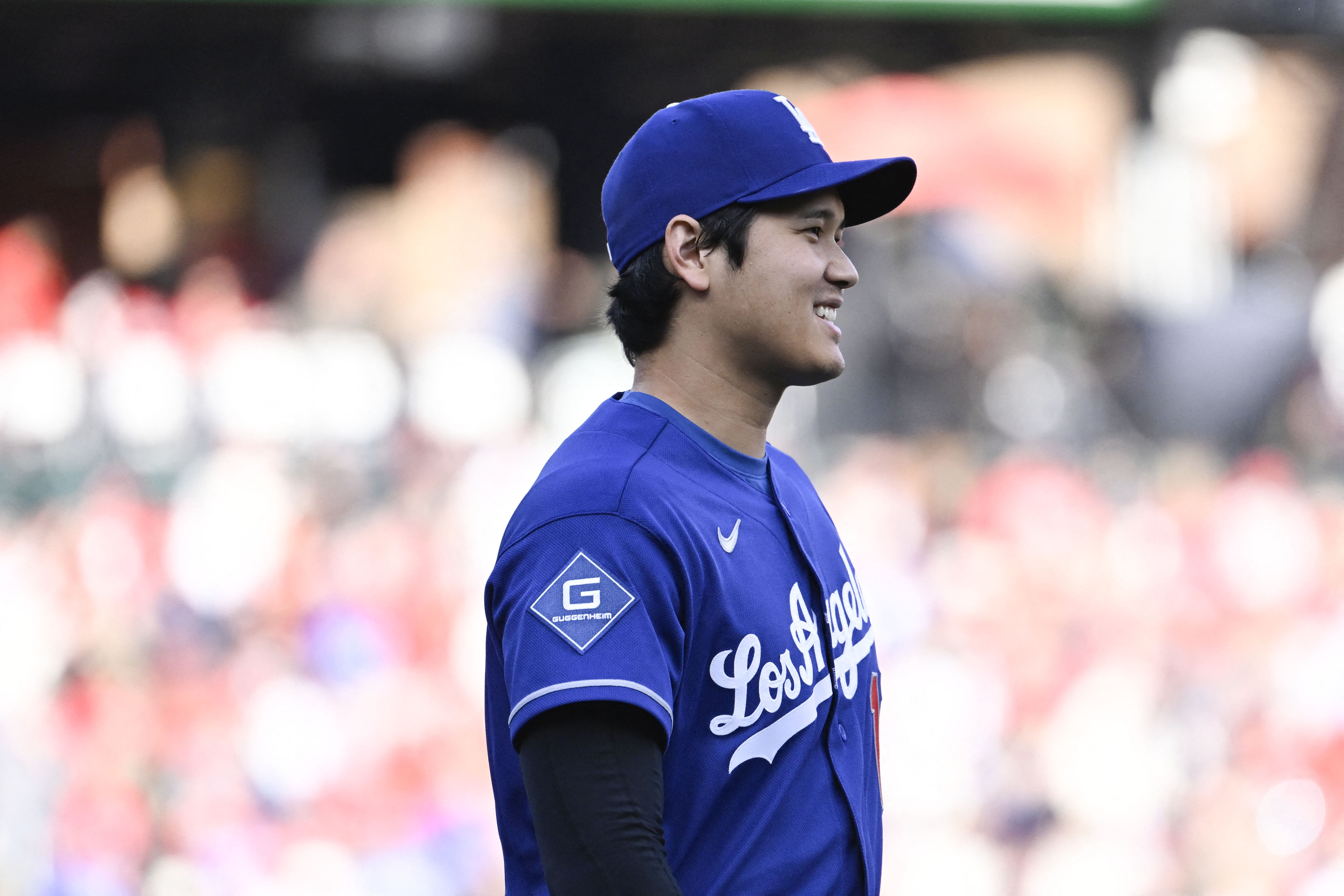 Los Angeles Dodgers designated hitter Shohei Ohtani (17) looks on as we break down our Dodgers vs Astros prediction.
