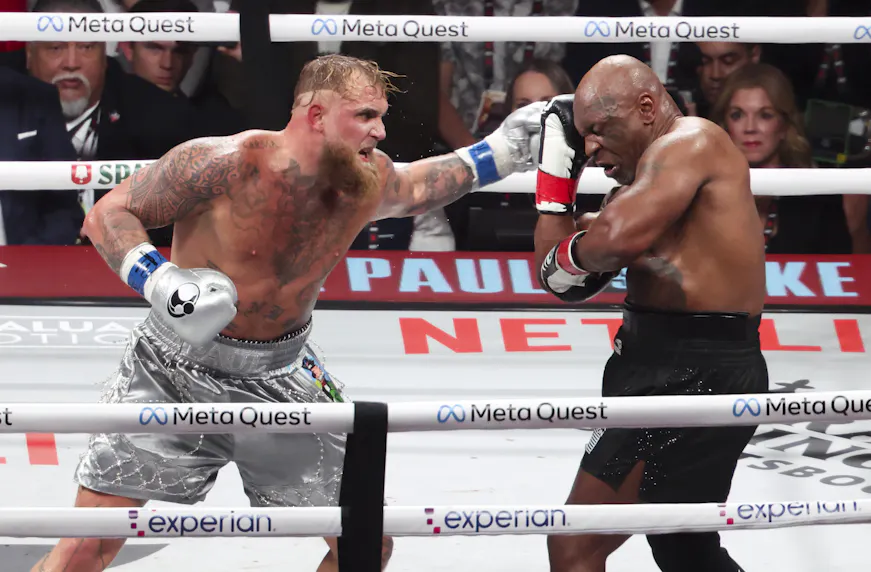 Mike Tyson (black gloves) fights Jake Paul (silver gloves) at AT&T Stadium as we look at Entain betting records