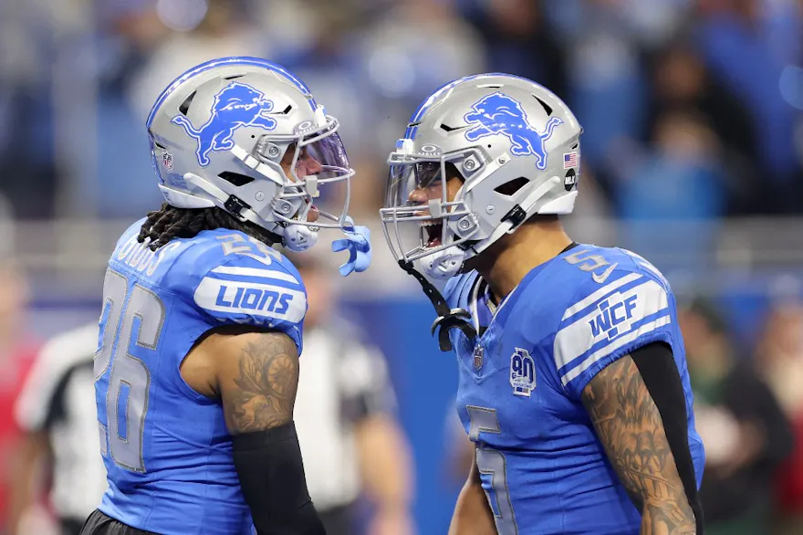 Jahmyr Gibbs of the Detroit Lions celebrates his touchdown with David Montgomery during the first quarter against the Los Angeles Rams as we look at the Michigan sports betting revenue report for January.