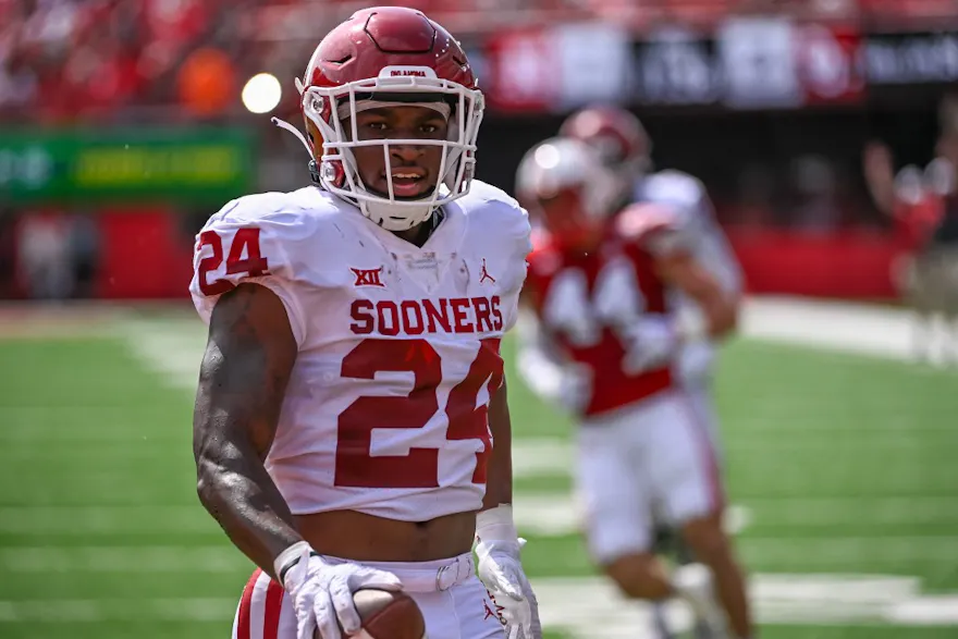 Running back Marcus Major of the Oklahoma Sooners scores on a touchdown pass against the Nebraska Cornhuskers.