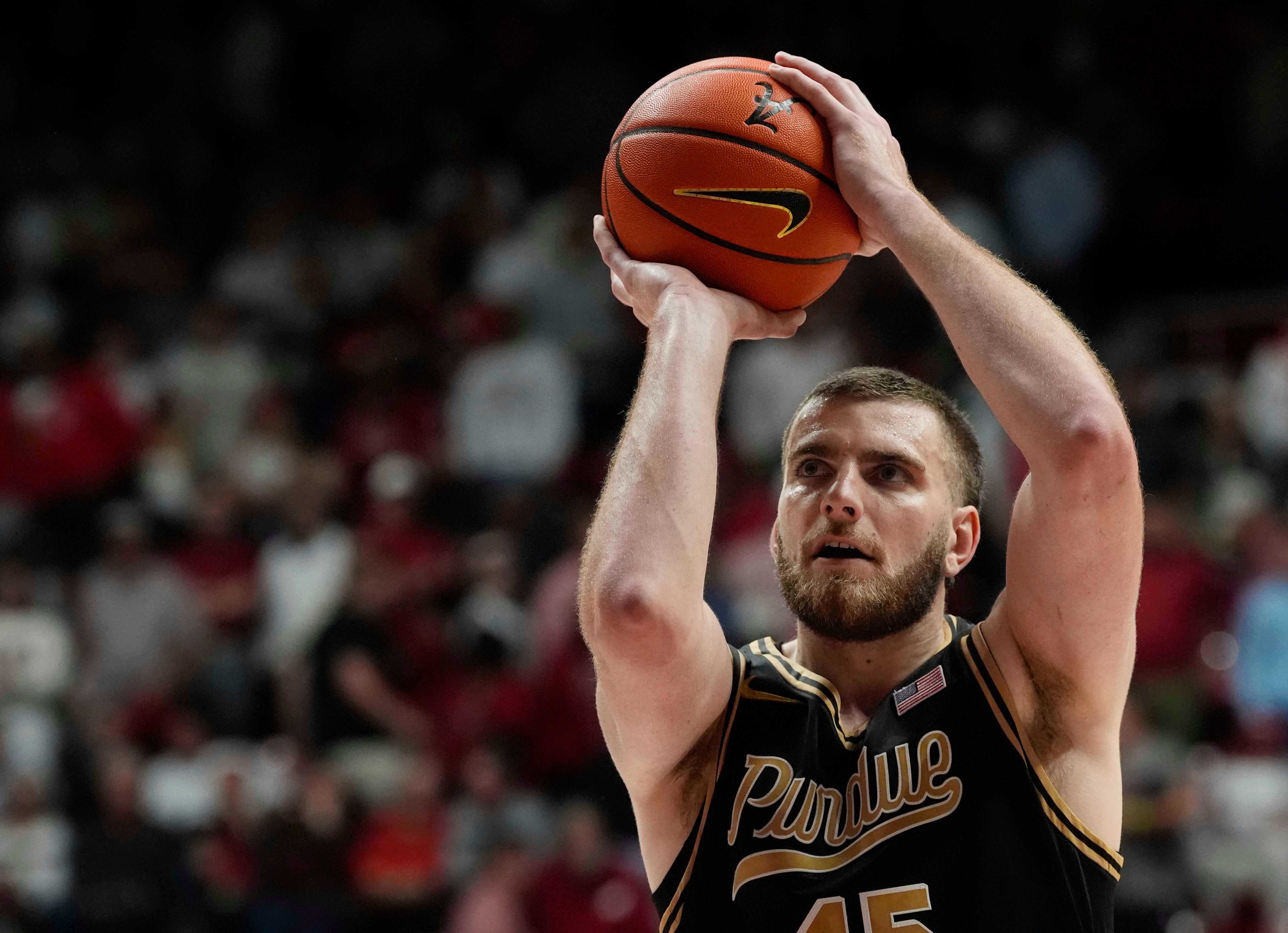 Purdue center Oscar Cluff (45) attempts a free throw as we offer our college basketball best bets and player props today