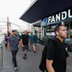 Fans walk past a Fanduel sports betting location at Footprint Center as we look at the FanDuel CEO speaking at the CNBC Evolve Global Summit.
