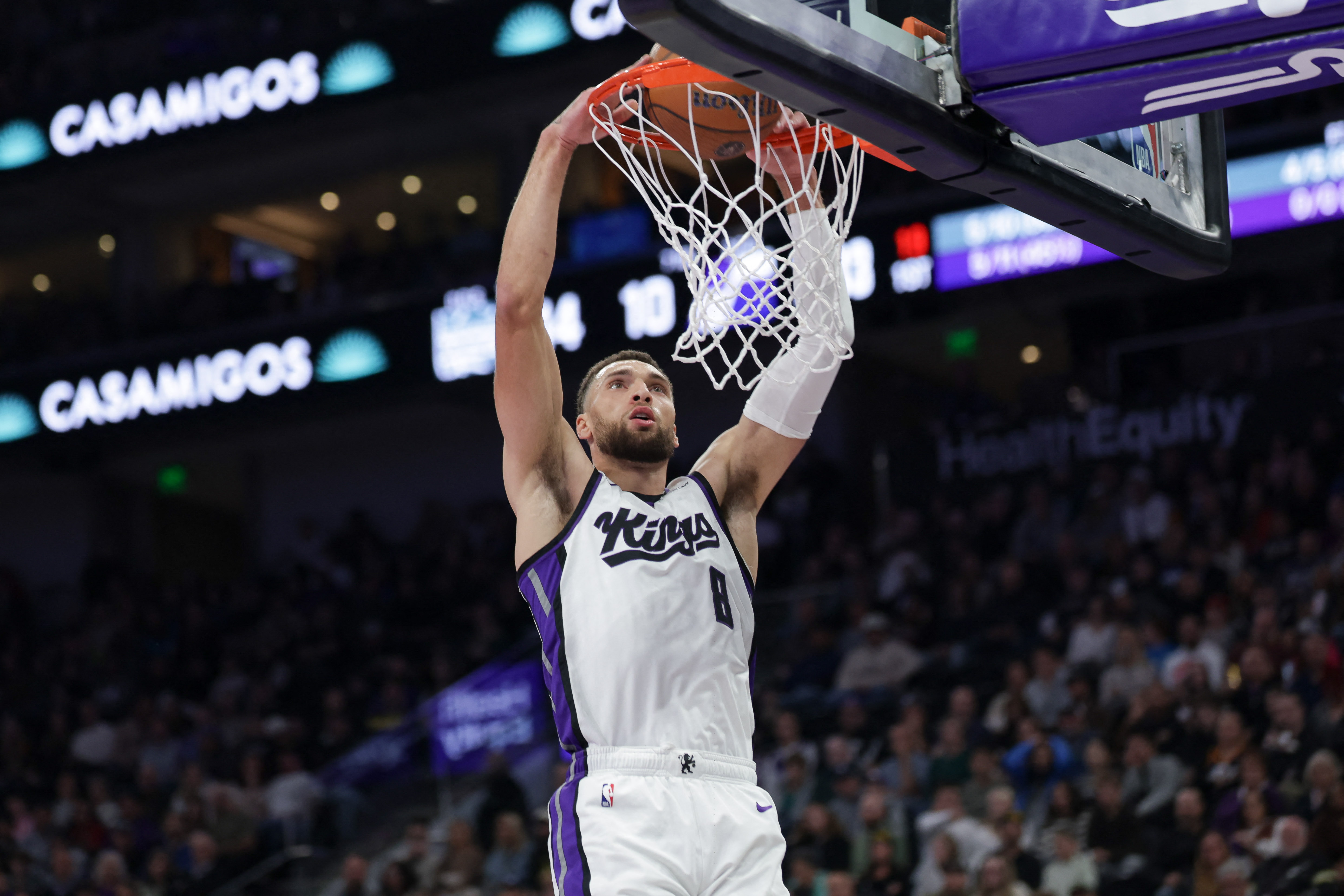 Sacramento Kings guard Zach LaVine (8) dunks the ball as we break down our NBA best bets today.