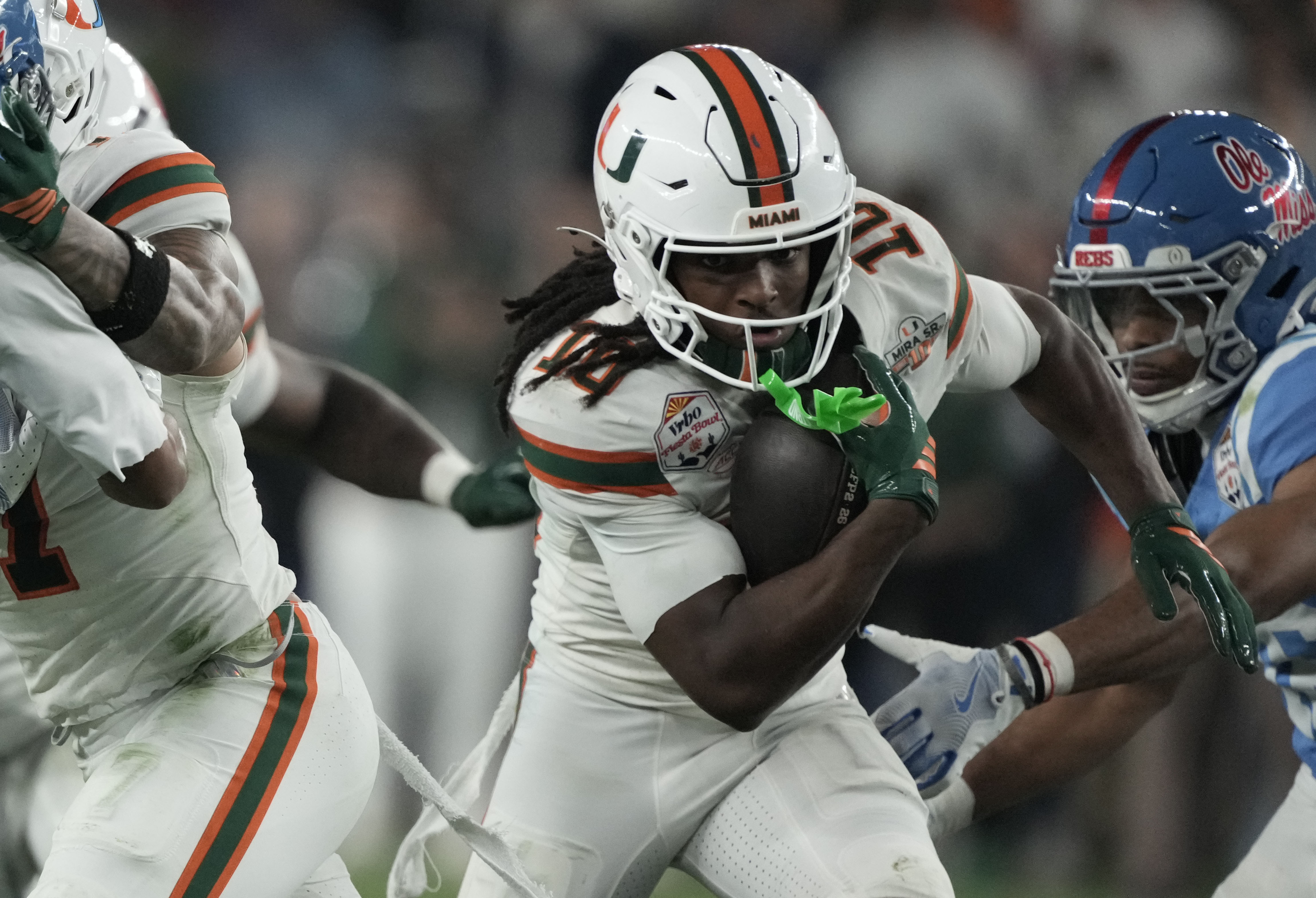 Miami's Malachi Toney (10) is among our first touchdown scorer predictions for Miami vs. Indiana in the CFP National Championship tonight.