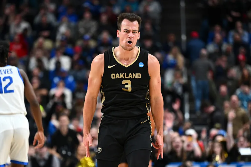 Jack Gohlke of the Oakland Golden Grizzlies celebrates after making a 3-pointer against the Kentucky Wildcats during the second half in the first round of the NCAA Men's Basketball Tournament as we look at our March Madness player props for Saturday.