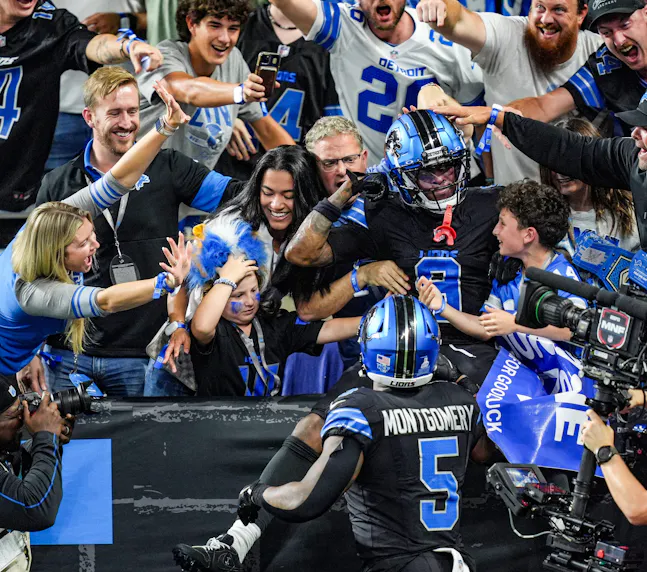 Detroit Lions wide receiver Jameson Williams jumps into the crowd after scoring a touchdown as we look at our anytime touchdown scorer predictions for Week 6.