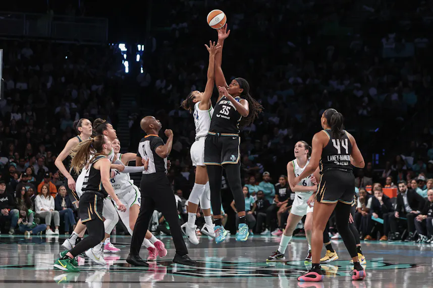 New York Liberty forward Jonquel Jones (35) wins a jump ball as we offer our Liberty vs. Lynx prediction for Game 3 of the WNBA Finals on Wednesday.